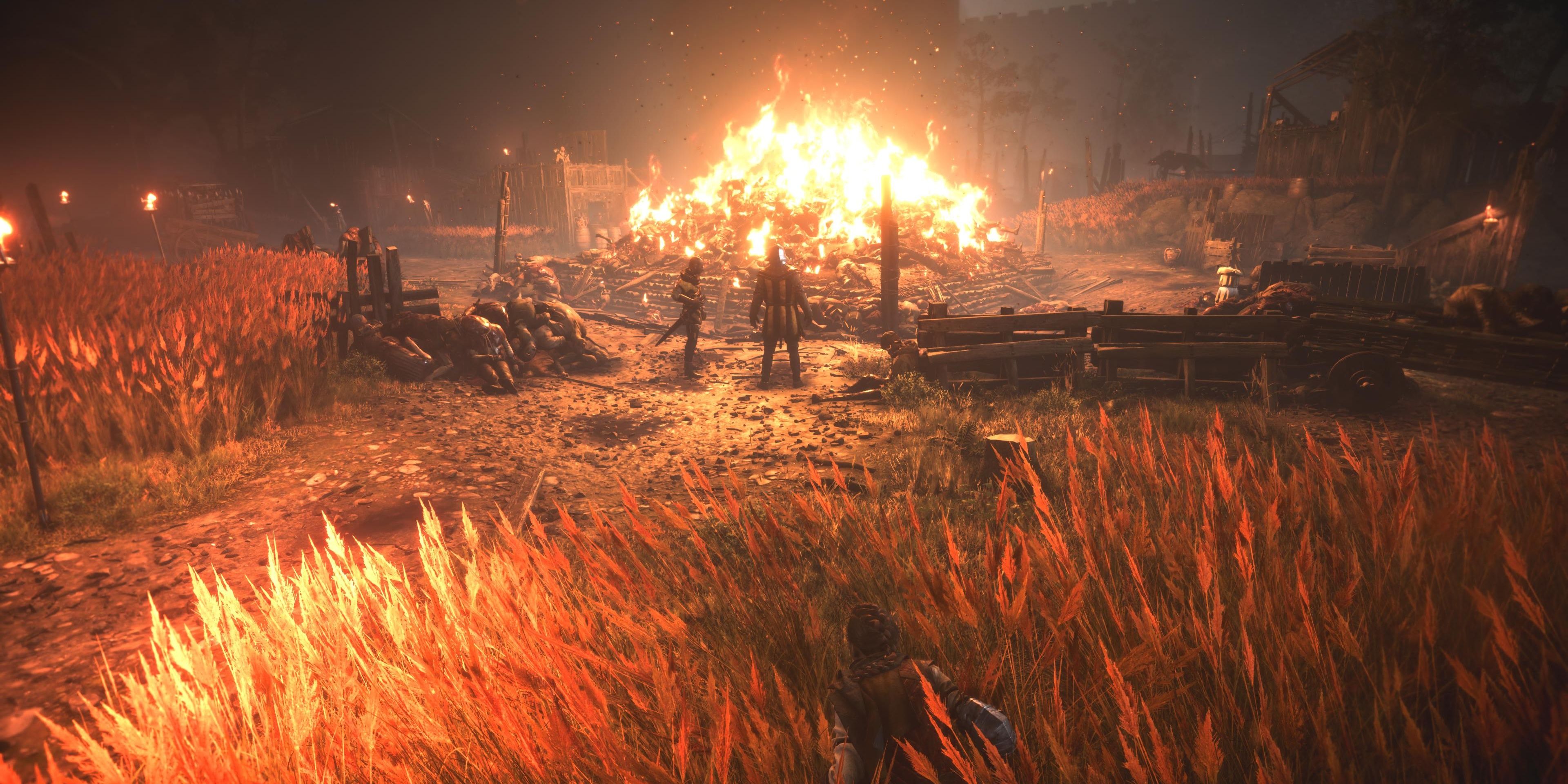 amicia hiding in the tall grass by the burning bodies