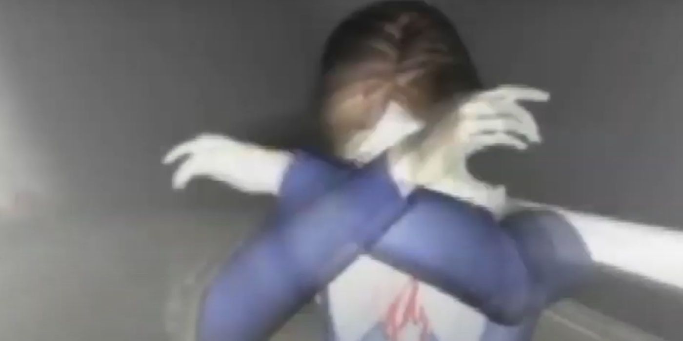 Alessa jumping in front of Harry's car in Silent Hill.