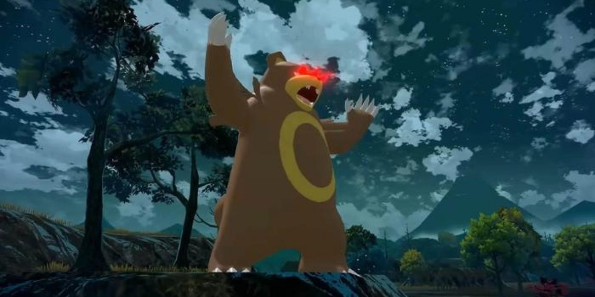 Alpha Ursaring roars on a mountain at night
