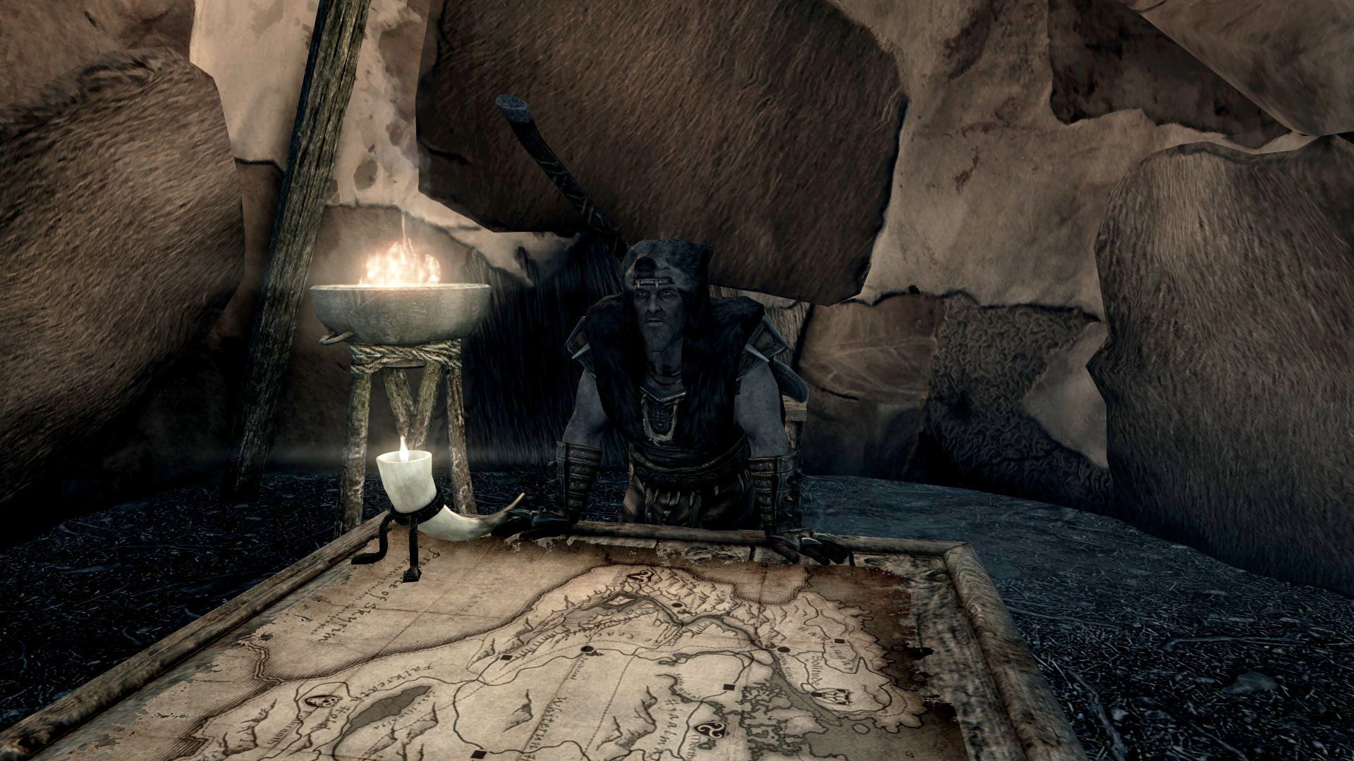 A man stands next to his map as he plans a military operation