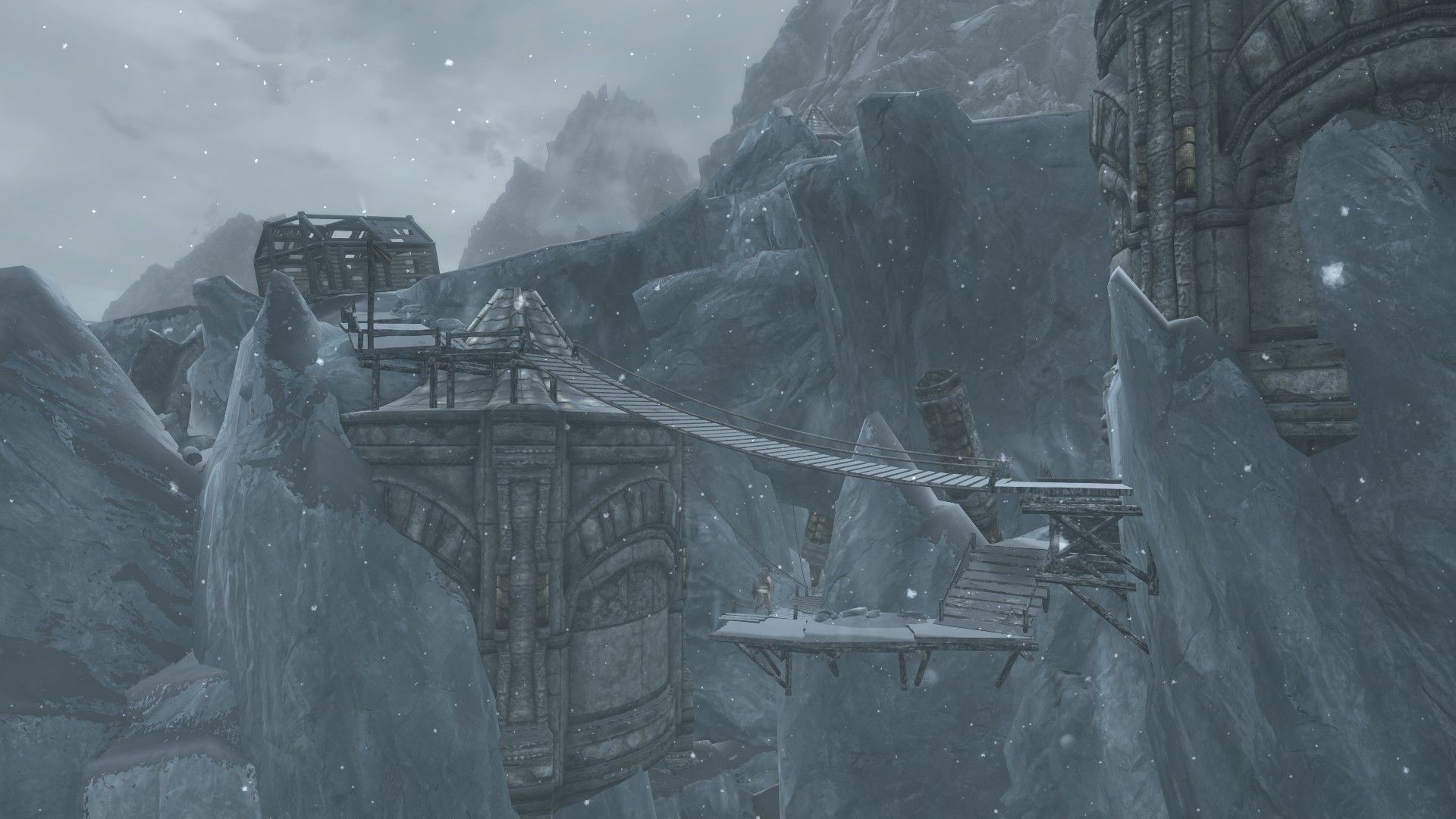 Ancient Dwarven ruins protrude from frozen ground on a snowy day