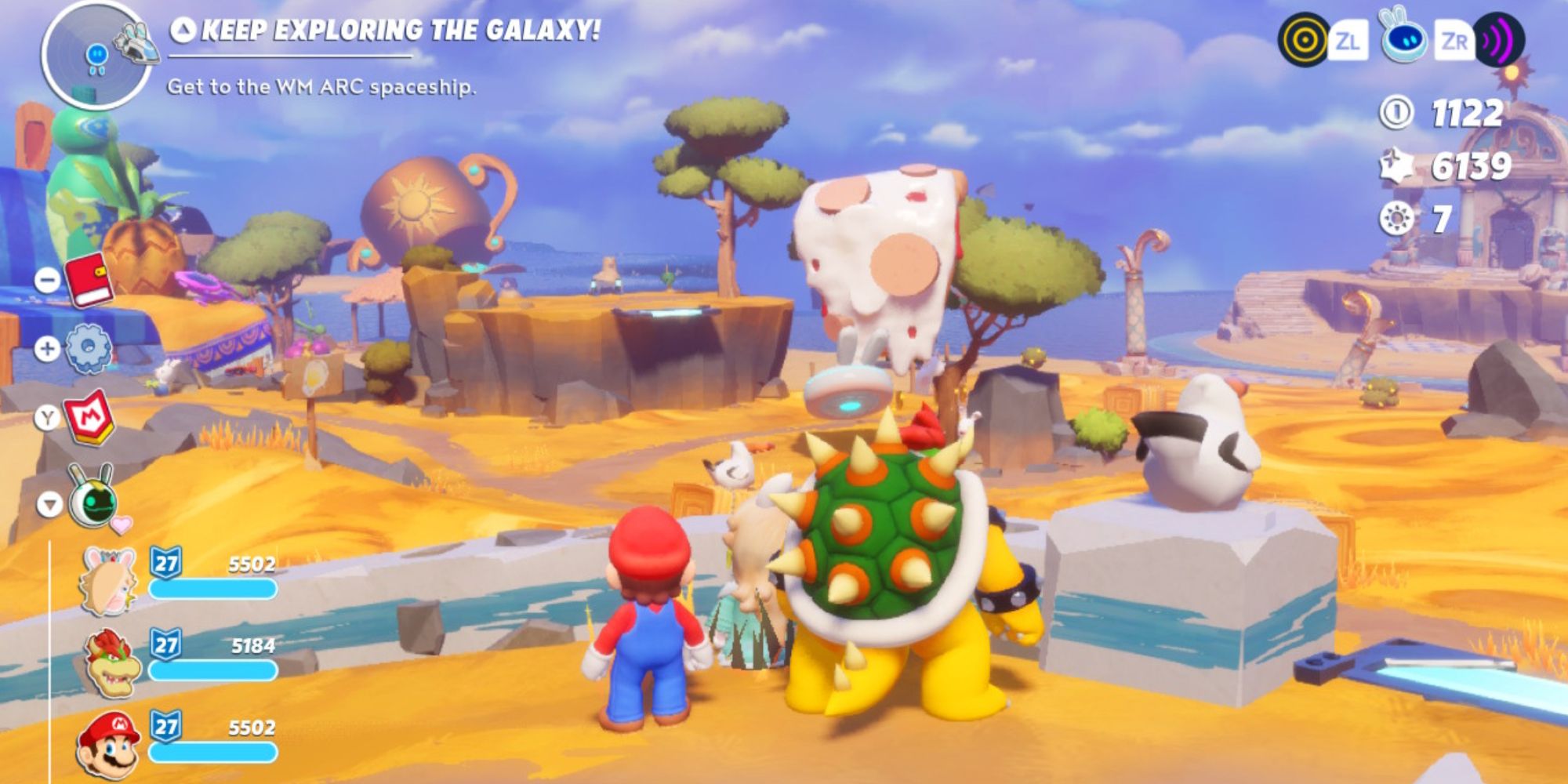 Mario Rabbids Sparks of Hope Beacon Beach Three Heroes Look Over Landscape