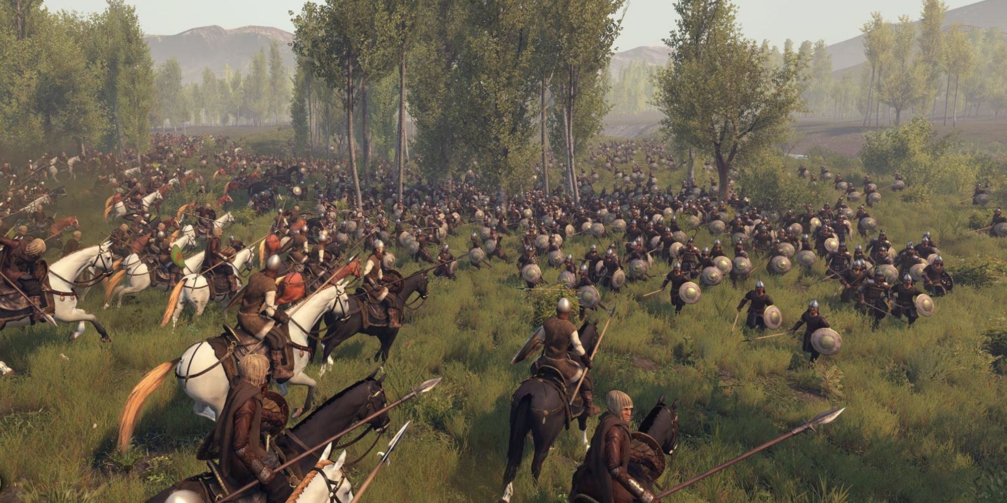 A huge battle on an open battlefield in Mount and Blade 2: Bannerlord