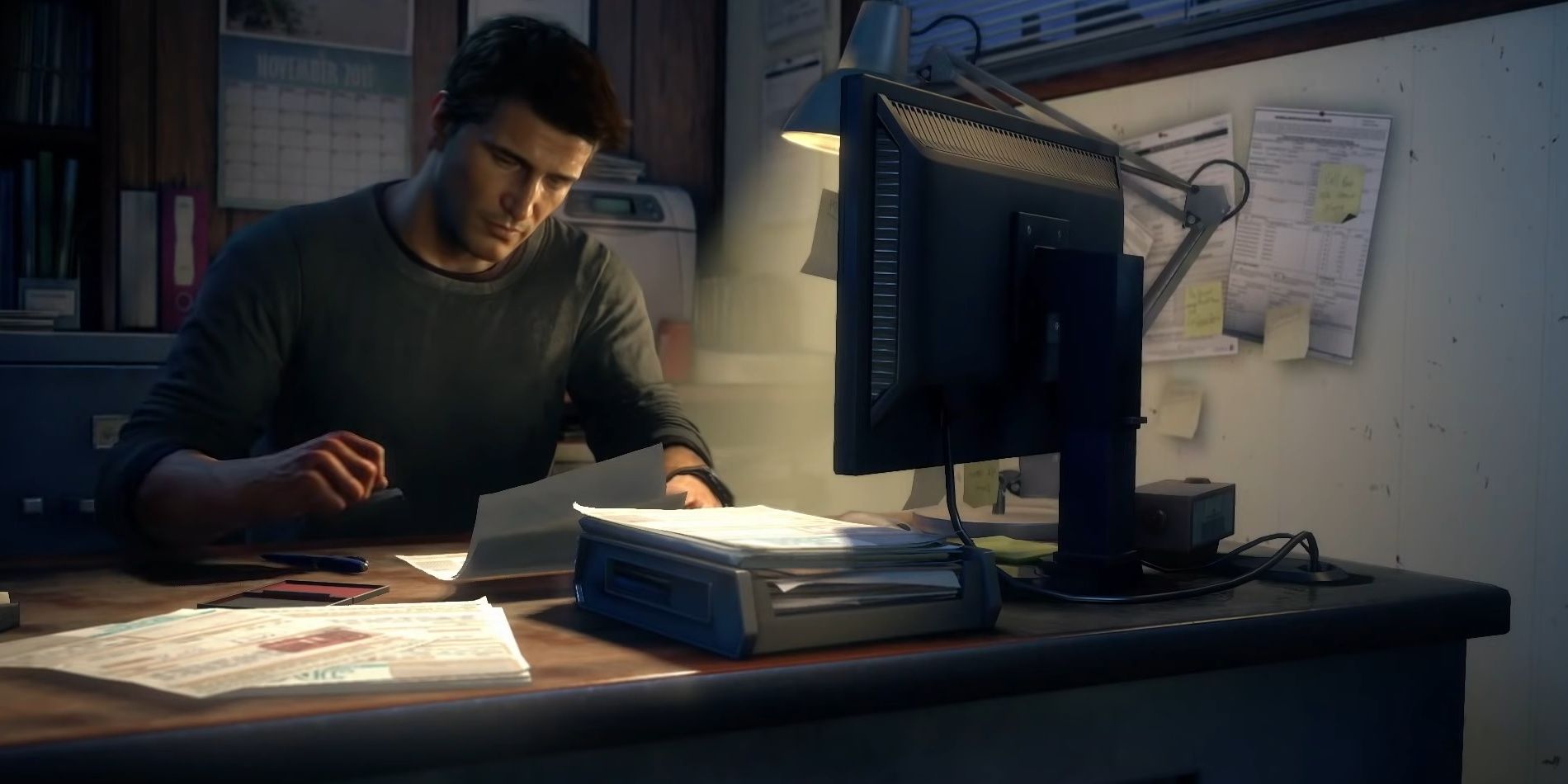 Nathan Drake working at his office in Uncharted 4: A Thief's End
