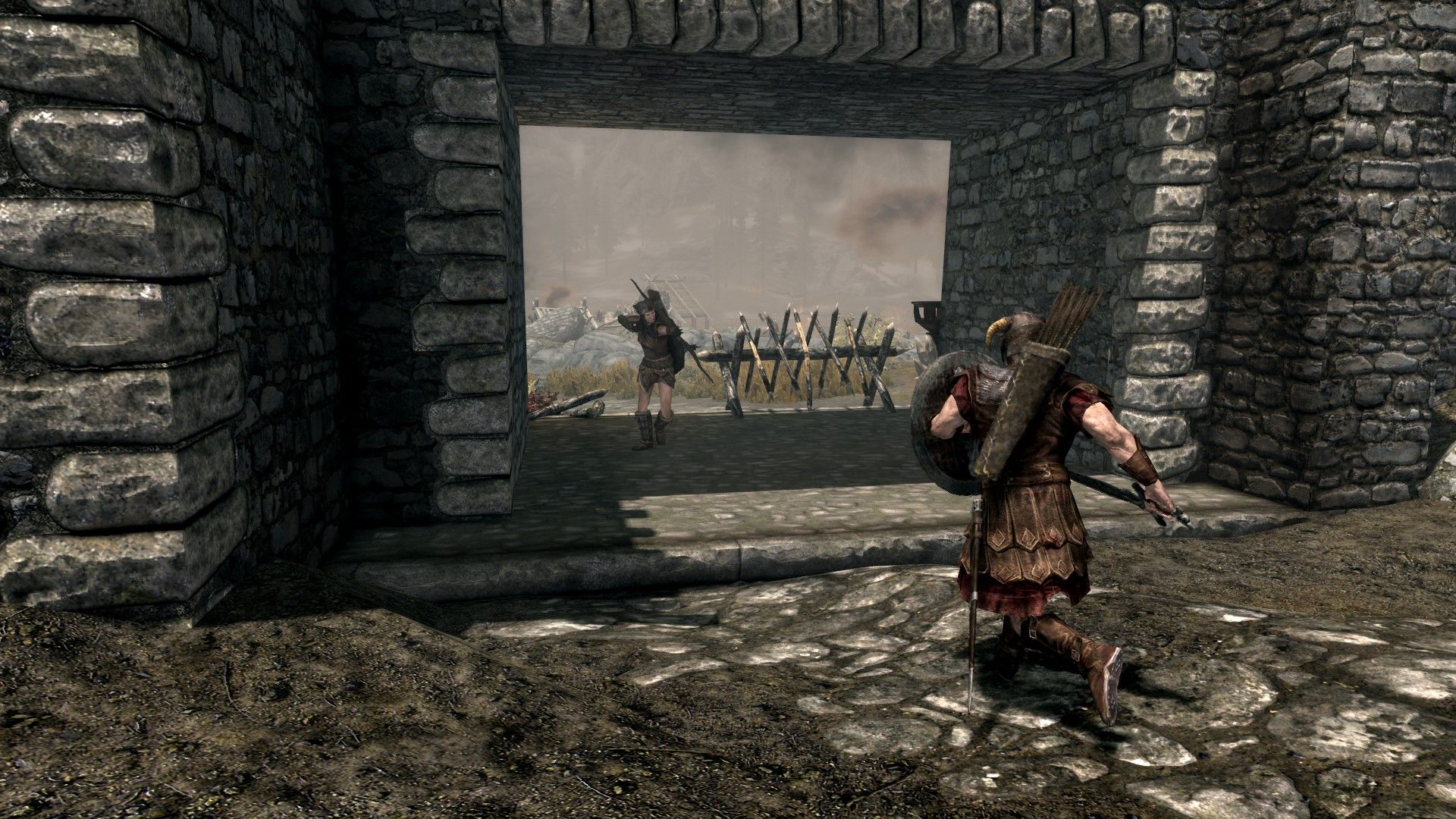 A man charges at an enemy at a city's gate