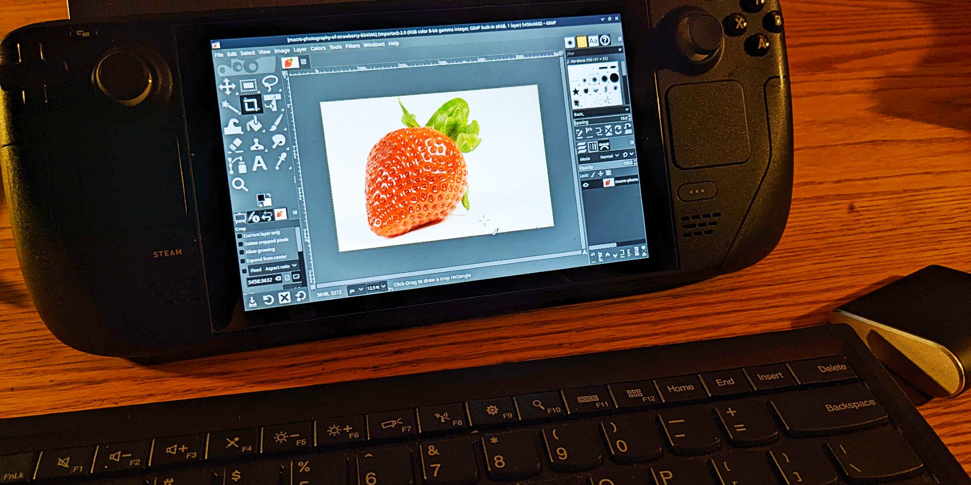 The image editing software Gimp running on the Steam Deck, currently editing a large strawberry.