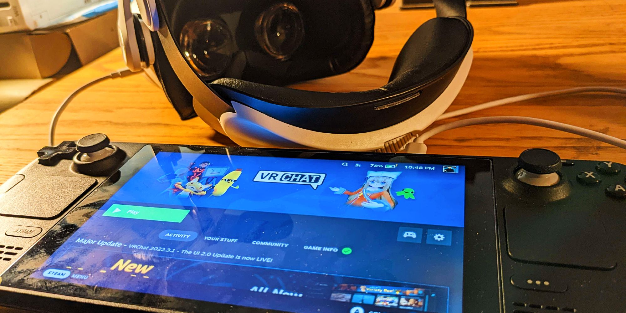 A Steam Deck plugged into an Oculus Rift VR headset, with VR Chat onscreen.