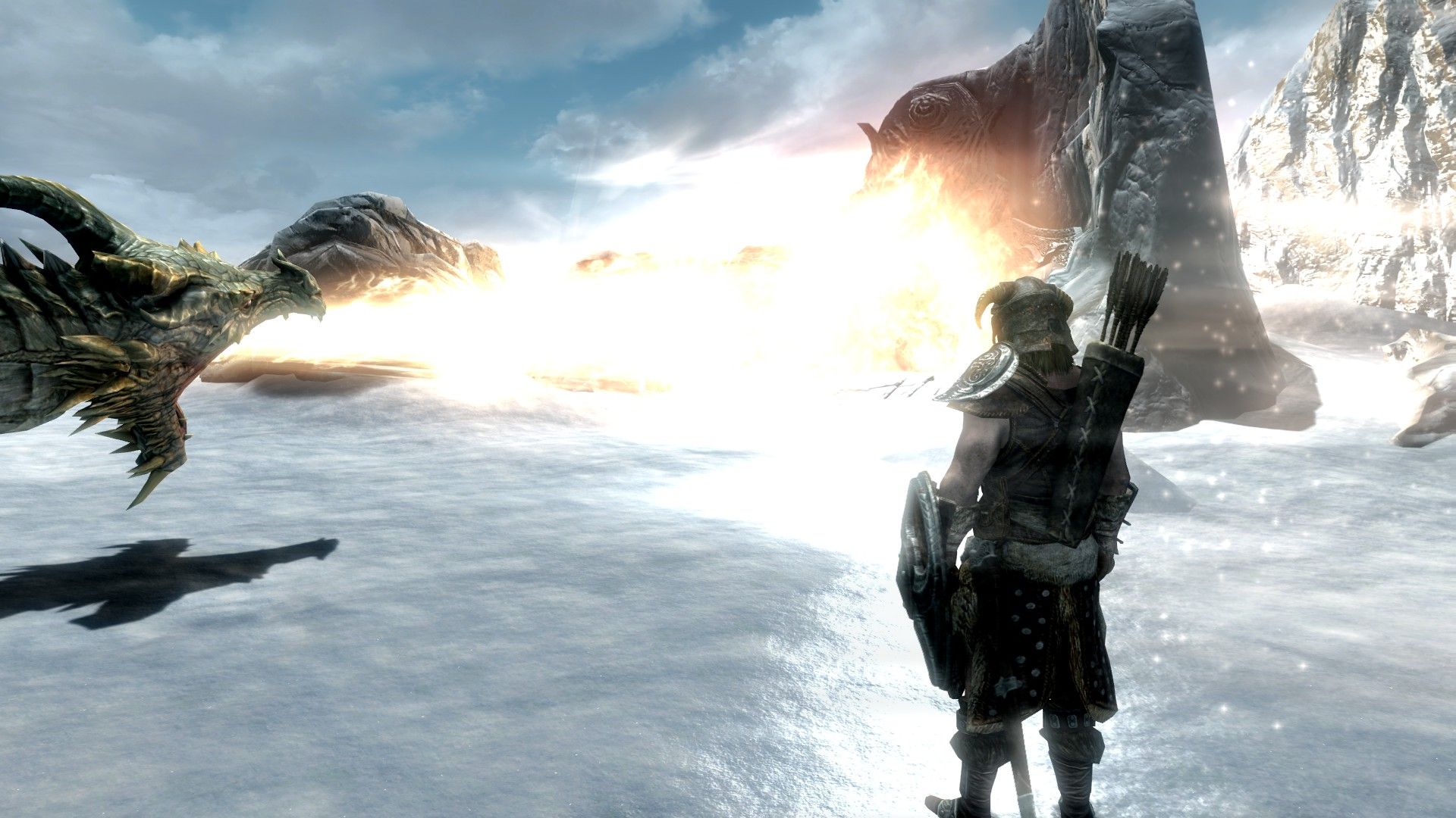 A dragon demonstrates his fire breath on a wall on a snowy mountain