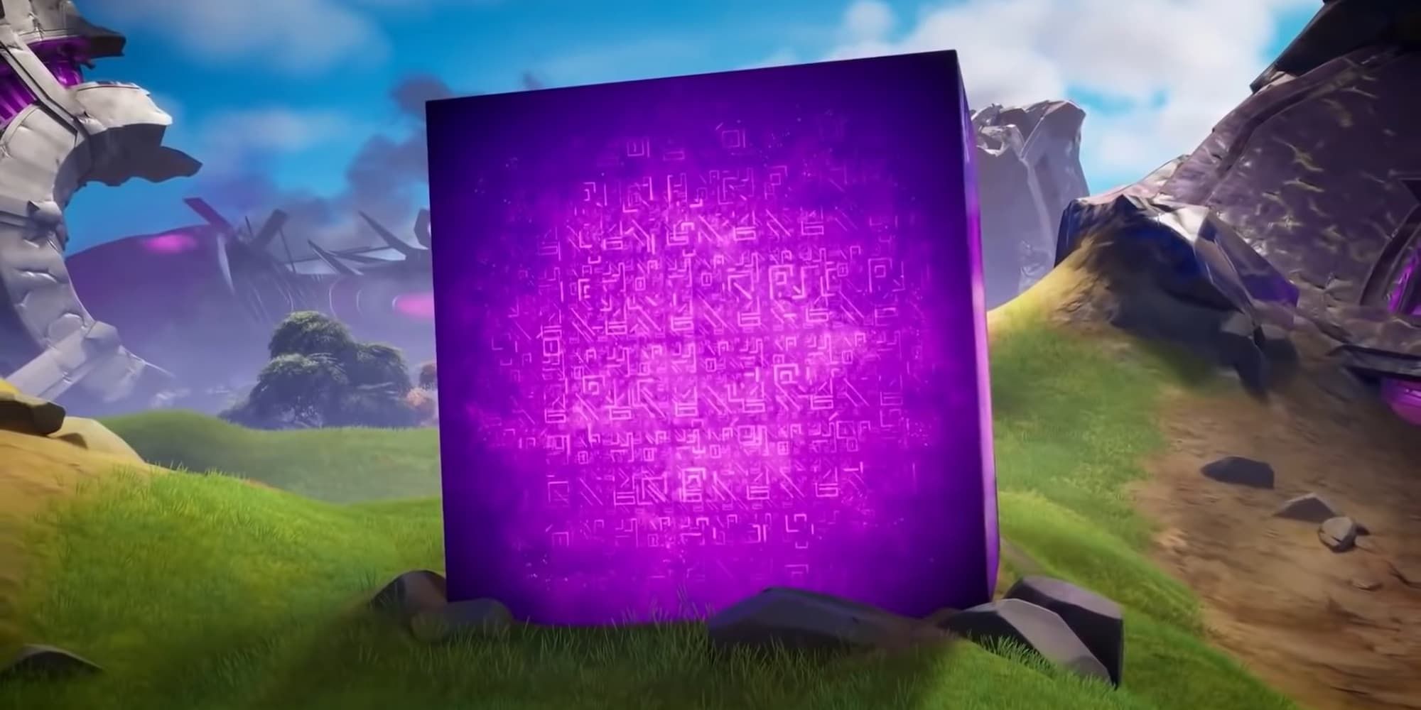 The Cube sits in the wreckage of the Alien Mothership in Fortnite.
