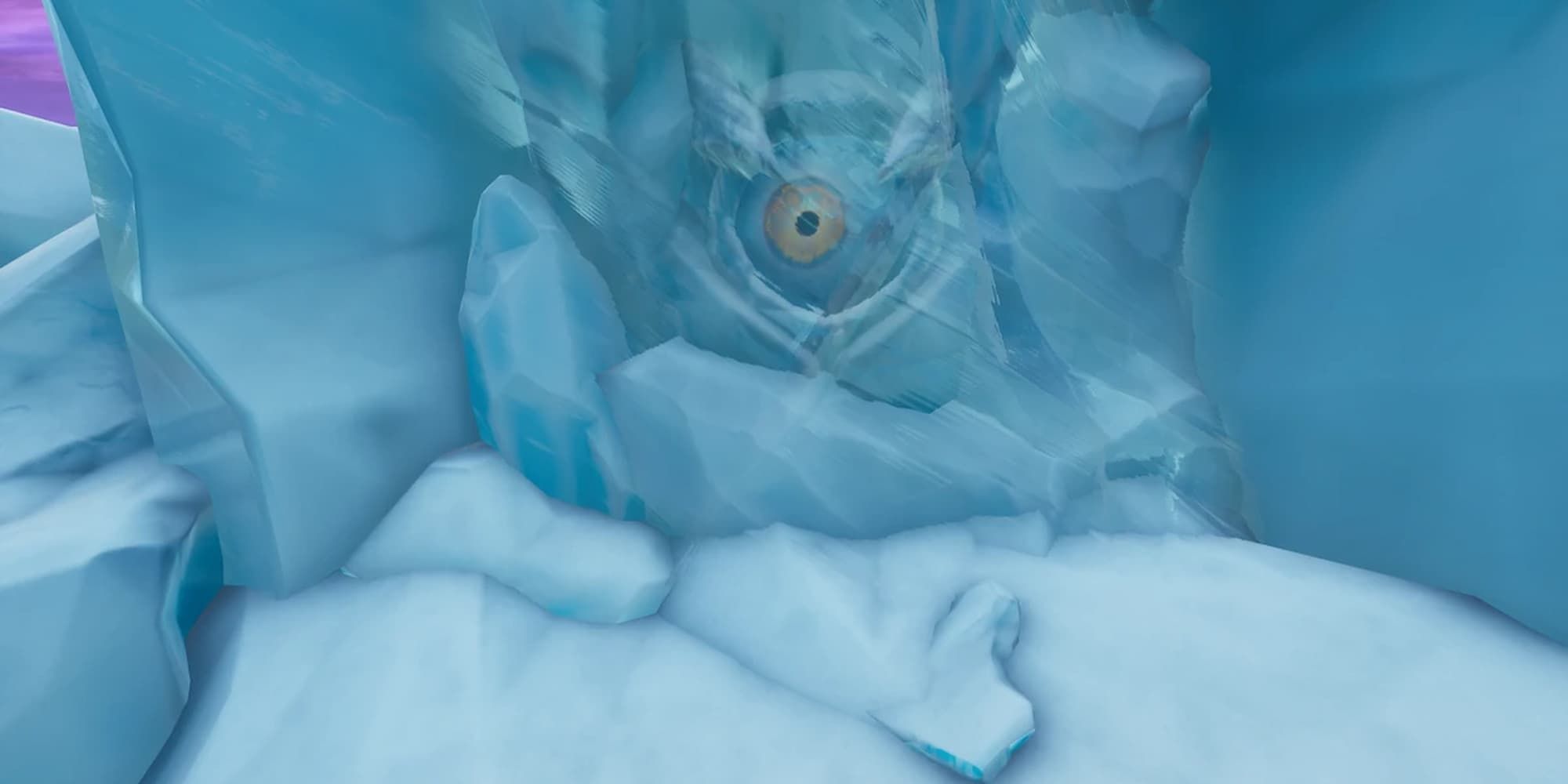 The Devourer's eye is seen in the frozen ice of a mountain in Fortnite.