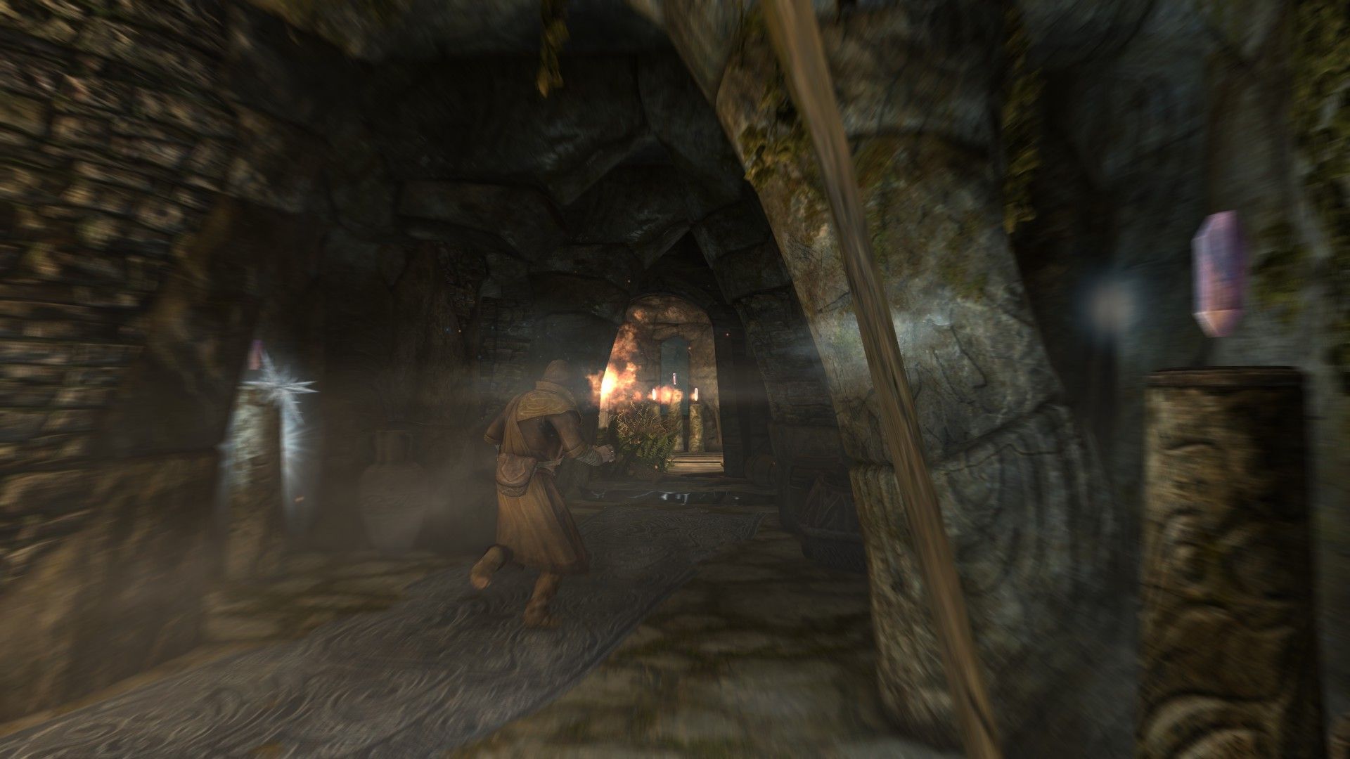 A man tries to scurry through a room lined with traps