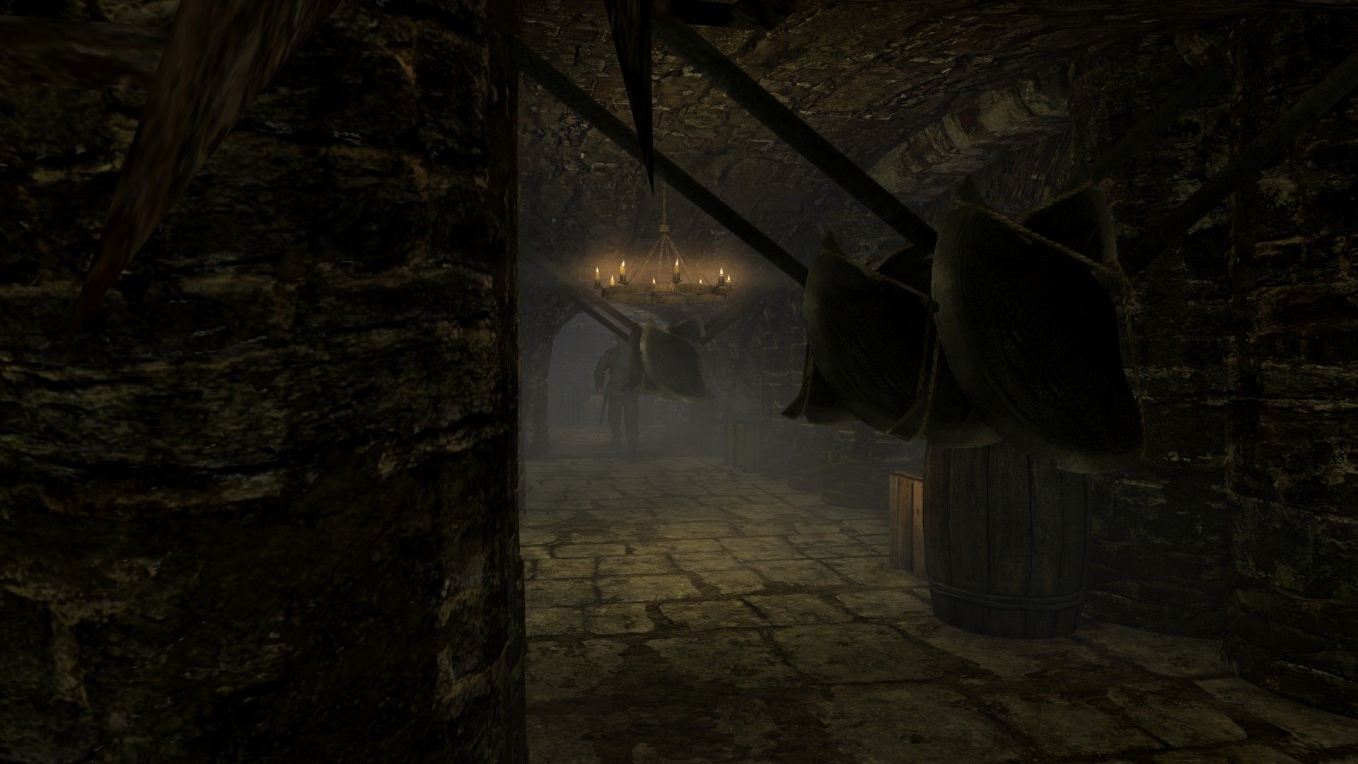 A man dashes past a hallway of swinging blades
