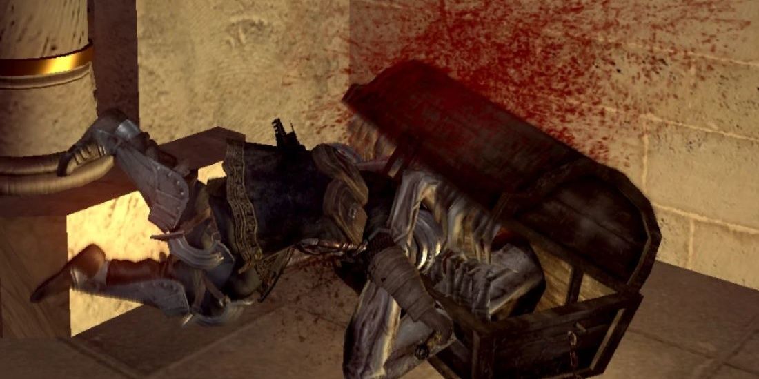 A Mimic devours the player in Dark Souls