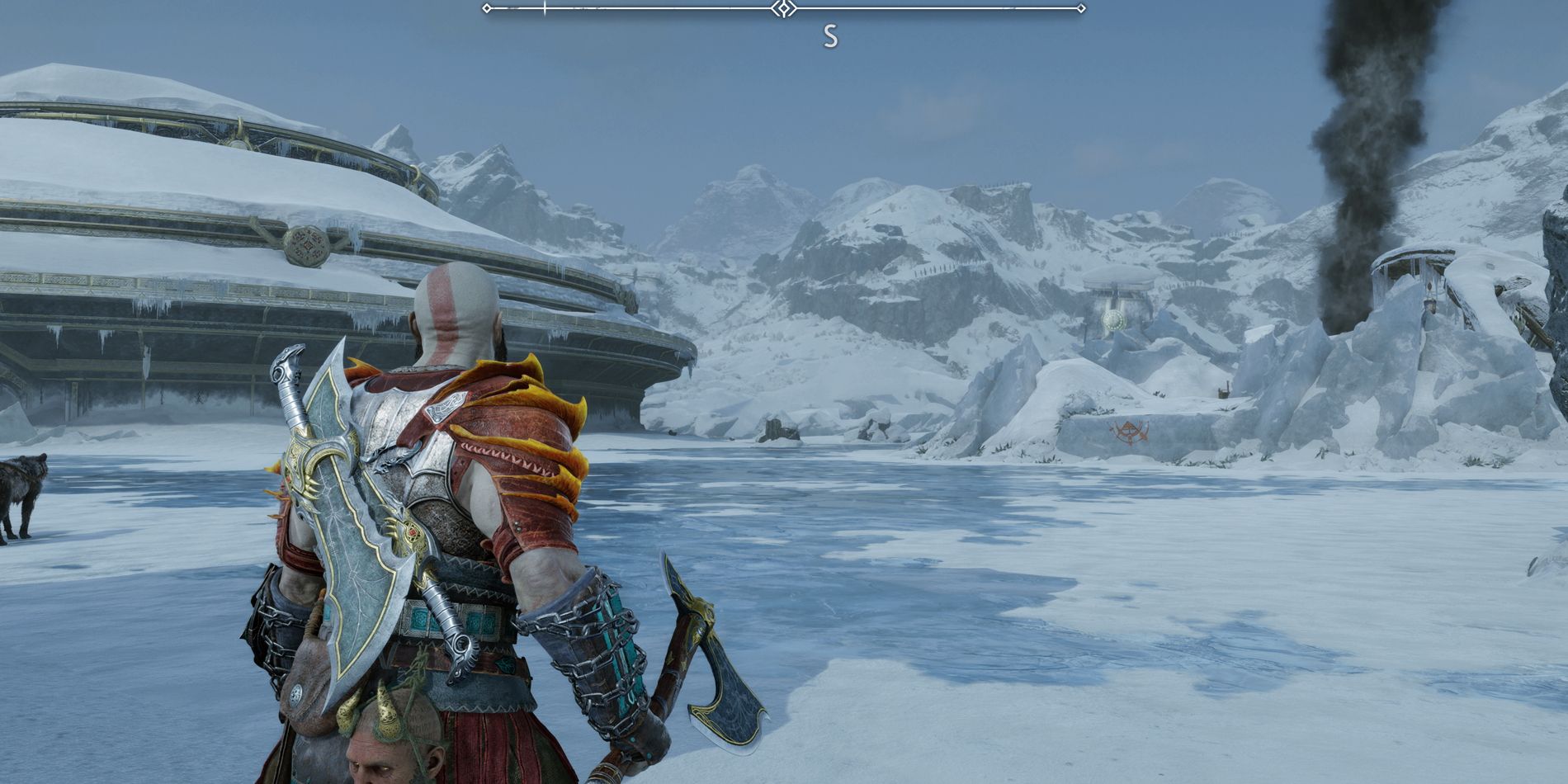 Kratos standing on the frozen-over Lake of Nine in God of War Ragnarok.
