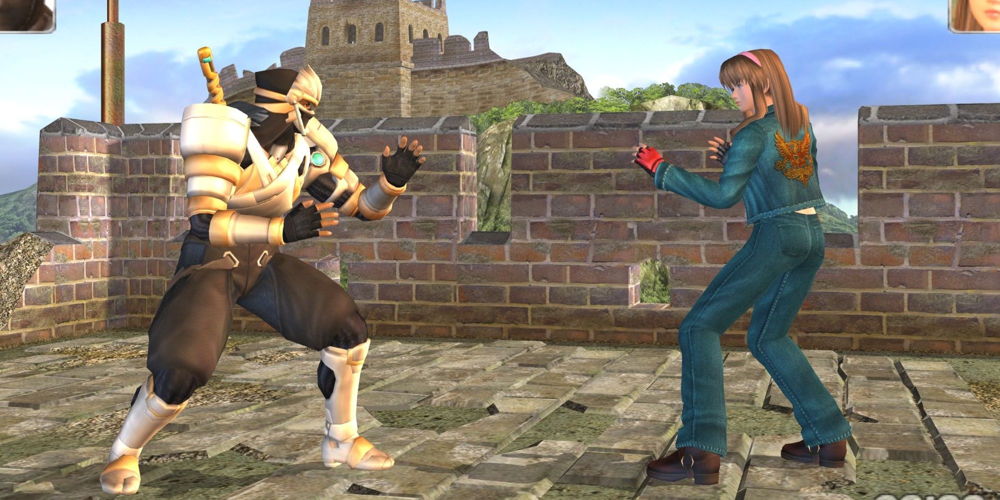 Ryu Hayabusa fighting off with Hitomi from Dead or Alive 2 Ultimate.