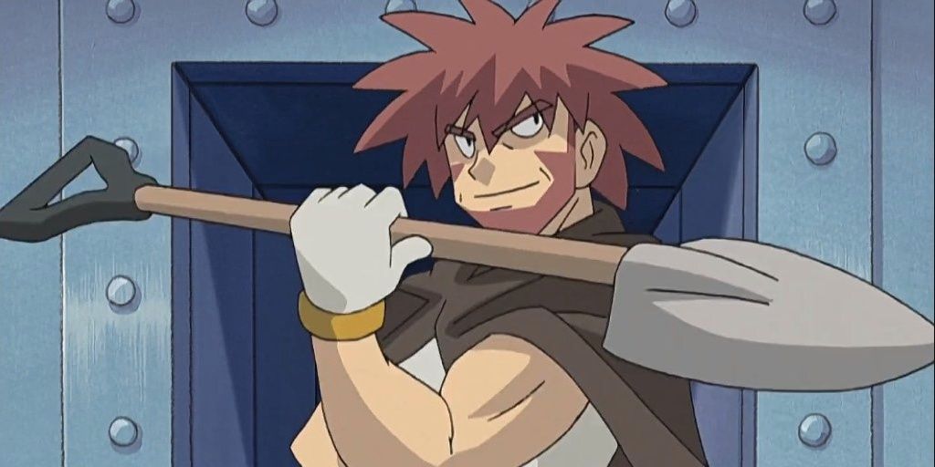 Byron holding his shovel in his gym