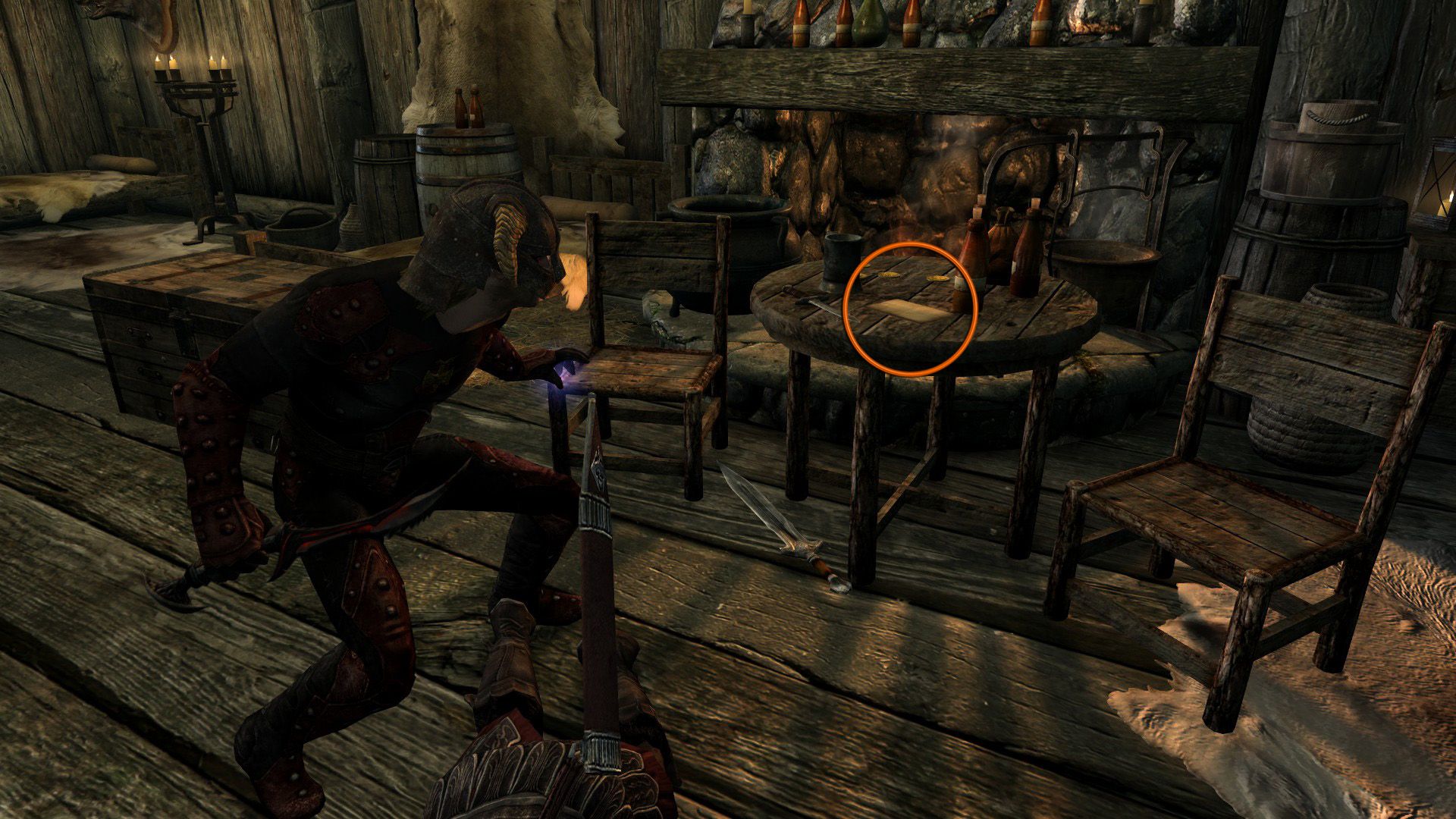 An annotated image highlighting a classified document within a military outpost with an assassin standing over a corpse.