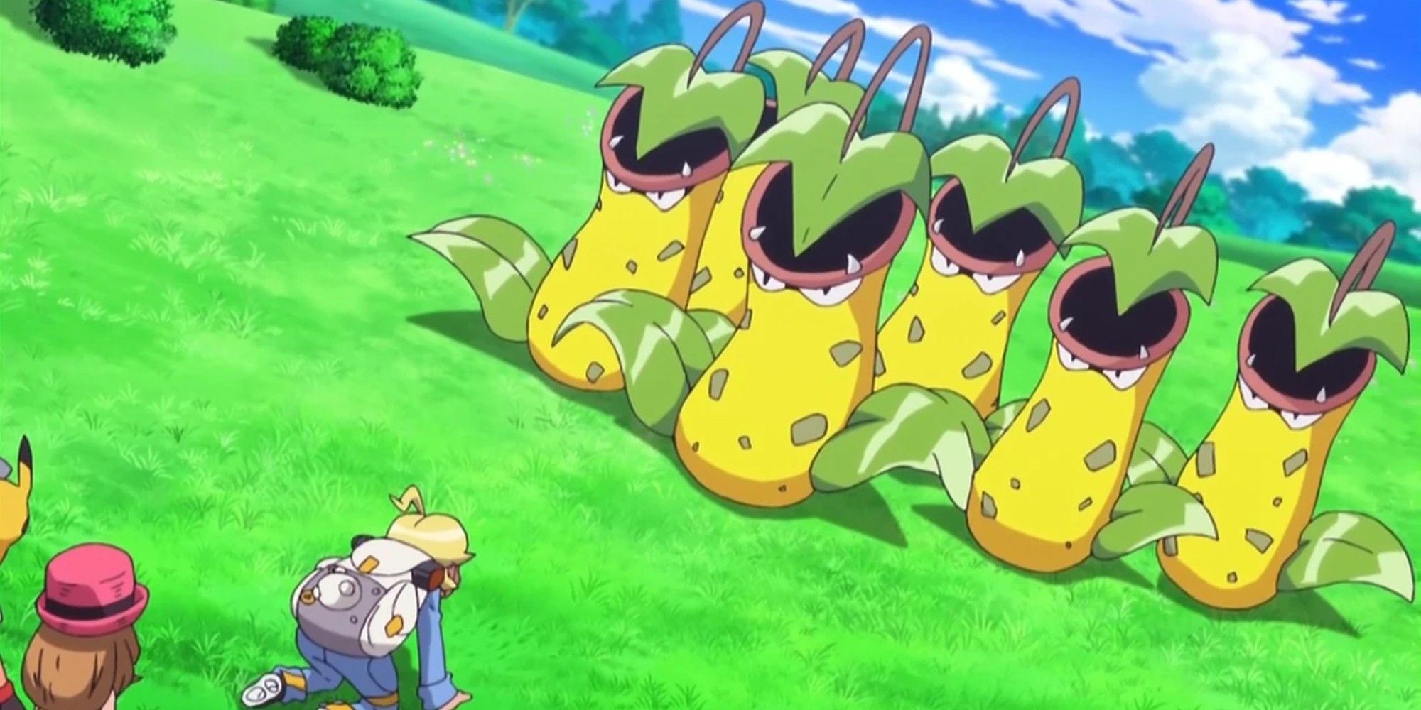 Victreebel from the Pokemon anime, several standing in front of Clemont in a grassy field