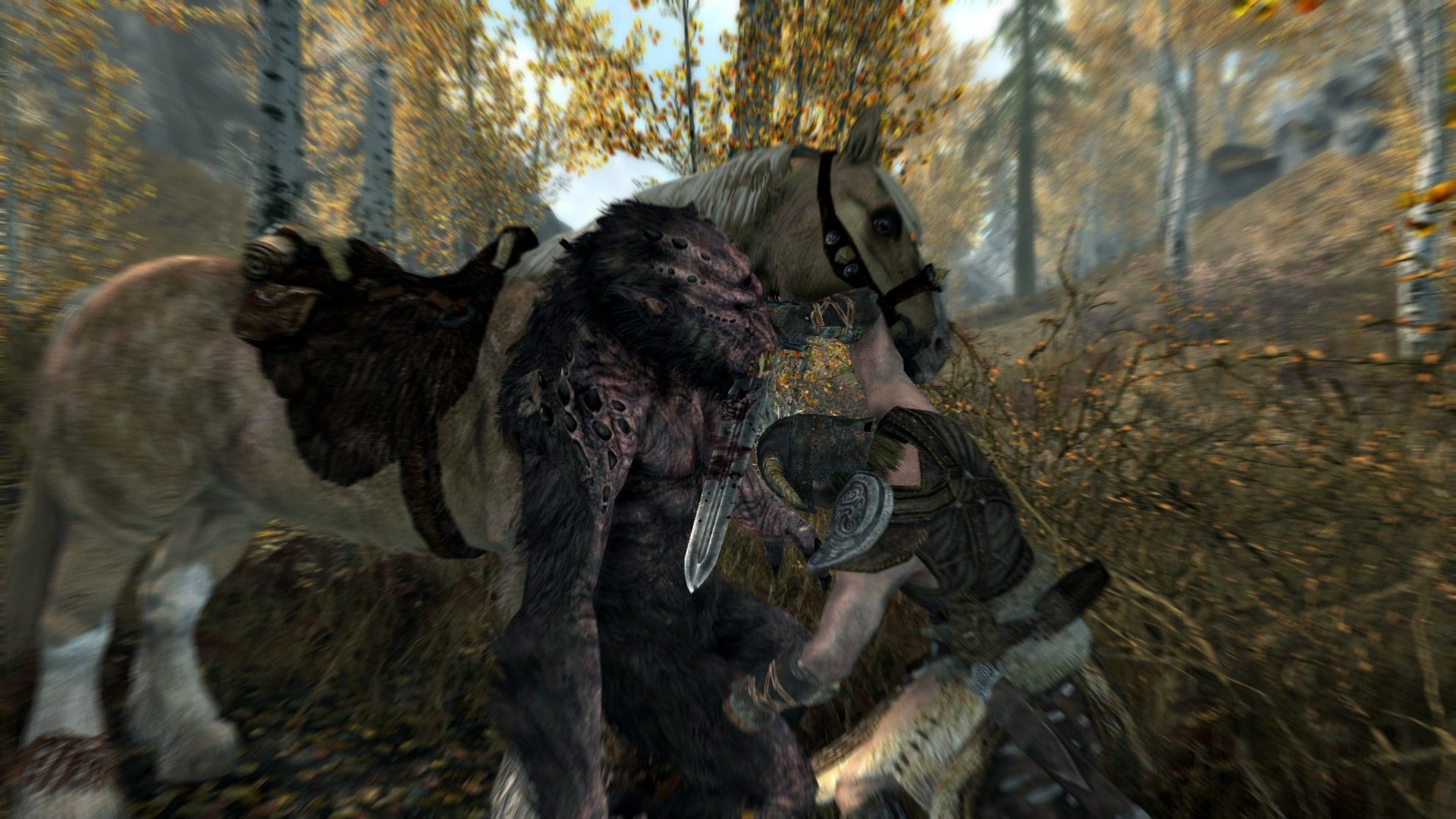 A warrior drives his sword through an enemy as a beige-colored horse stands in the background.