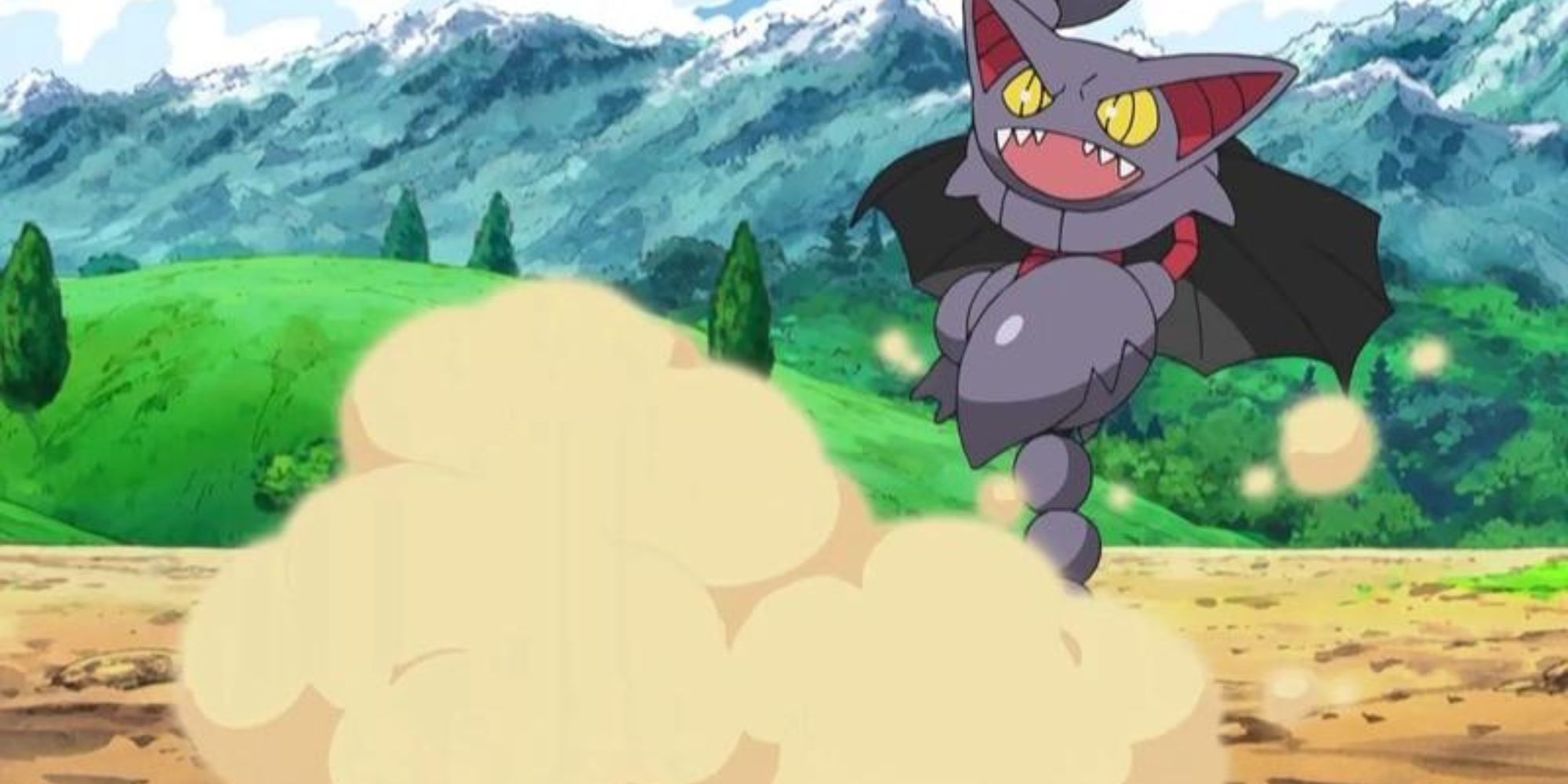 Gliscor uses sand attack in front of a mountain