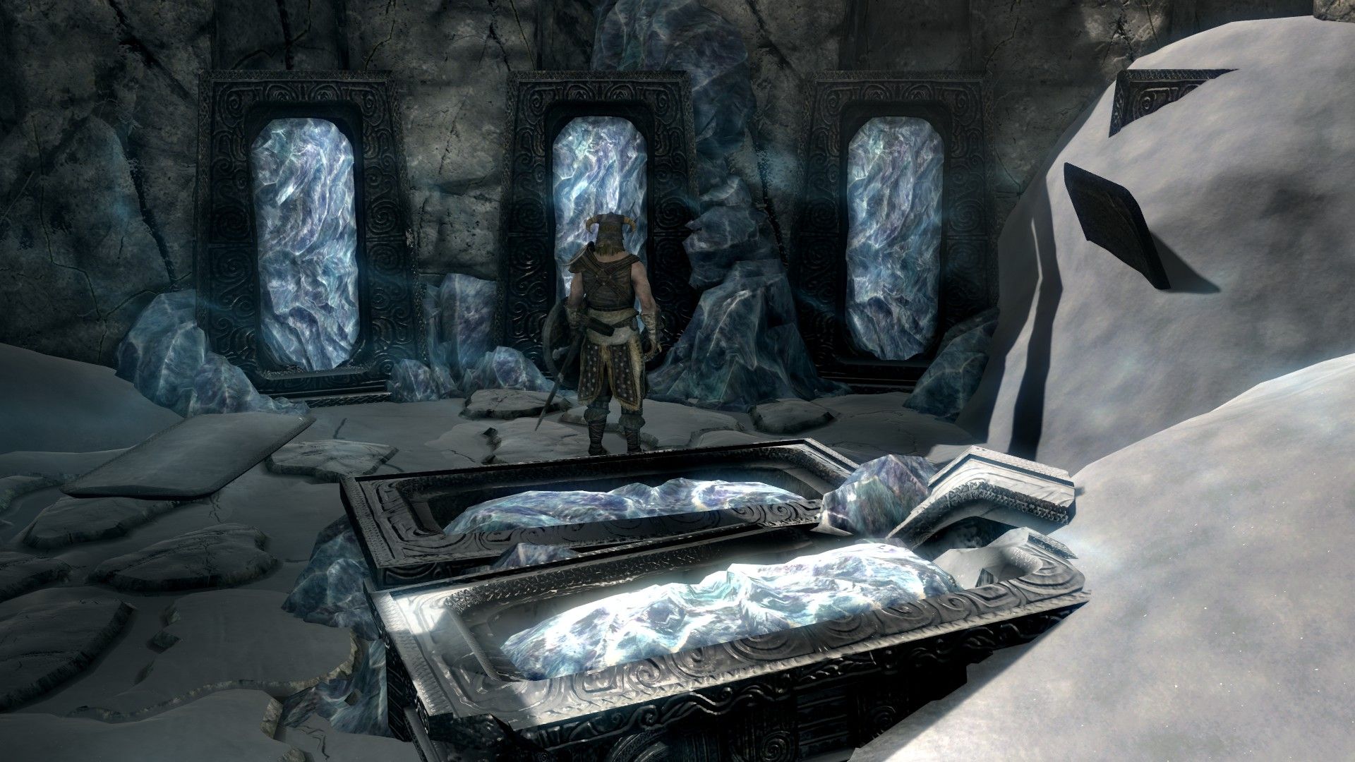 A man stand amidst coffins covered in a special kind of blue ice.