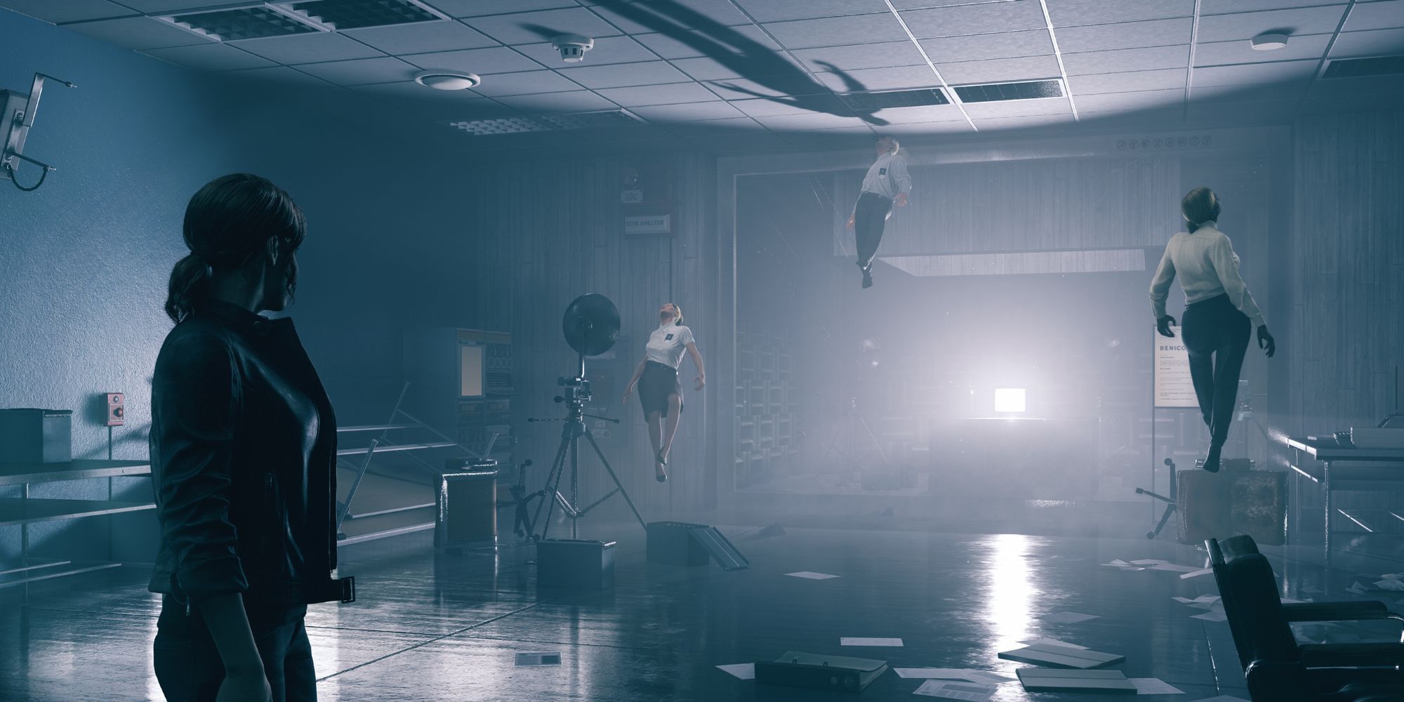 Jesse looks at floating employees as a bright white light emits from a screen at the end of the room