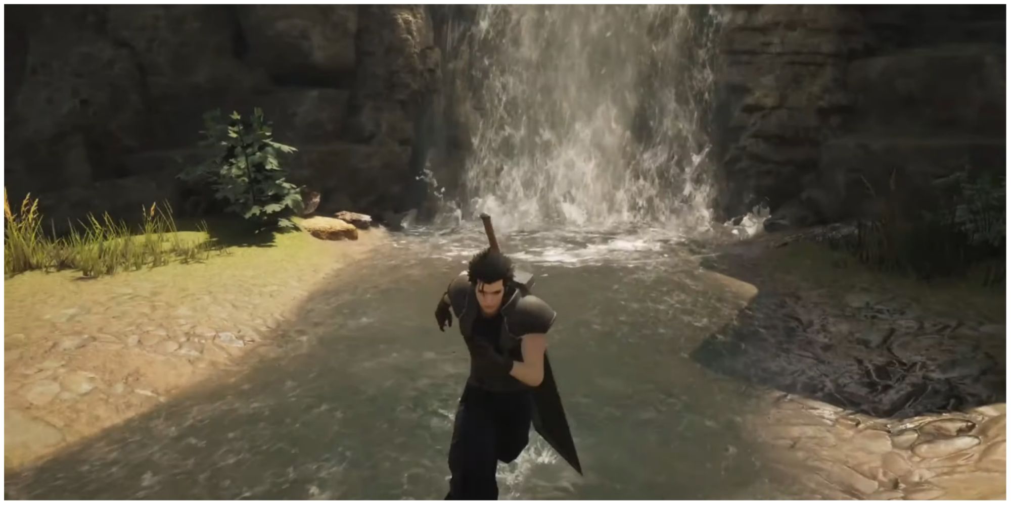 Zack ruynning in front of a waterfall