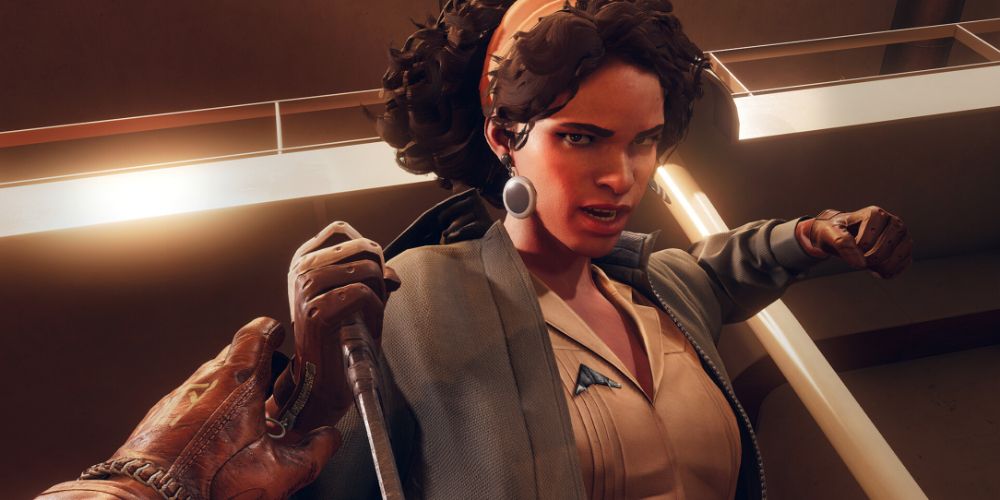 Juliana with a knife in one hand and her other fist raised