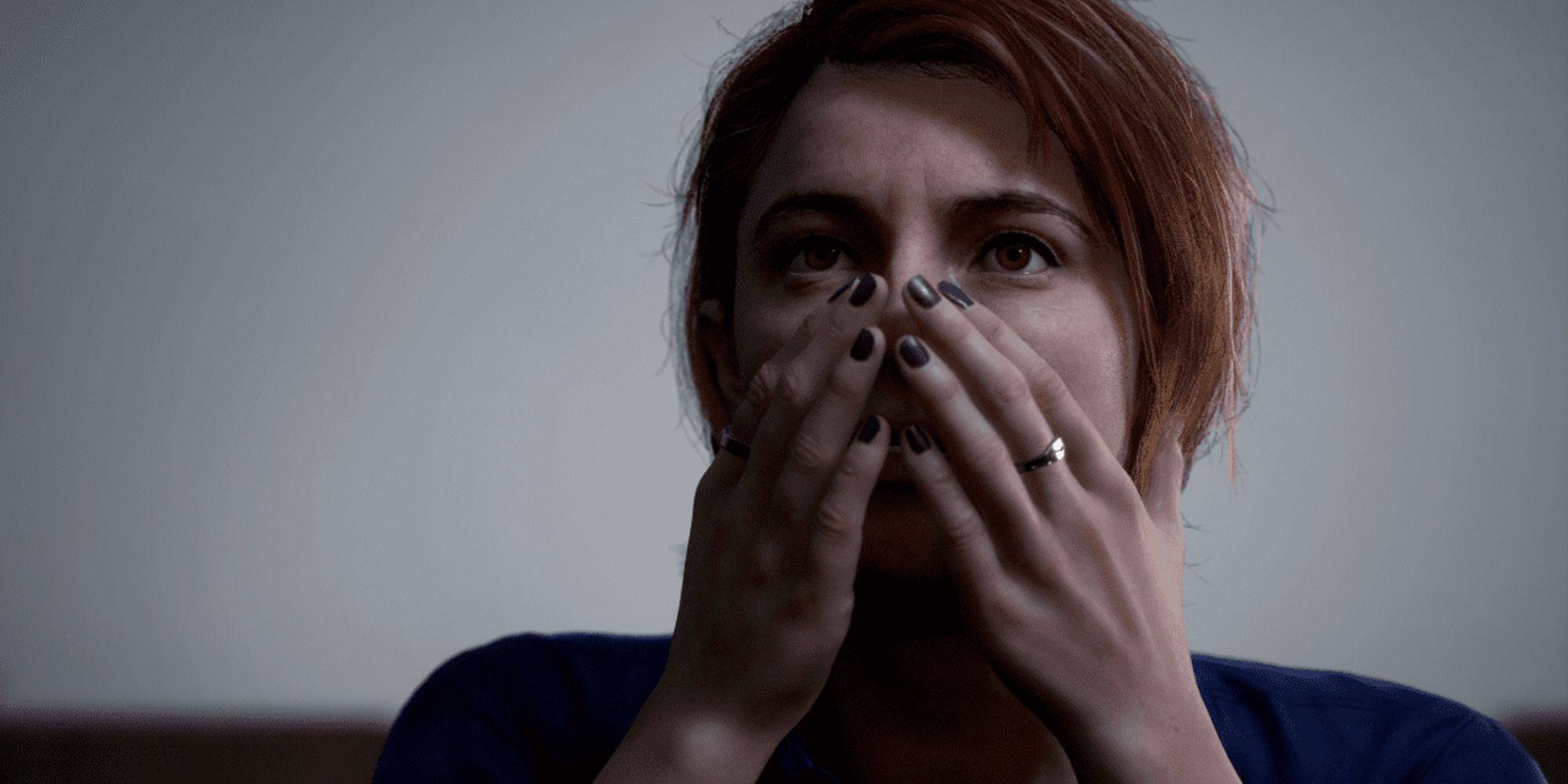 Kate covers her mouth