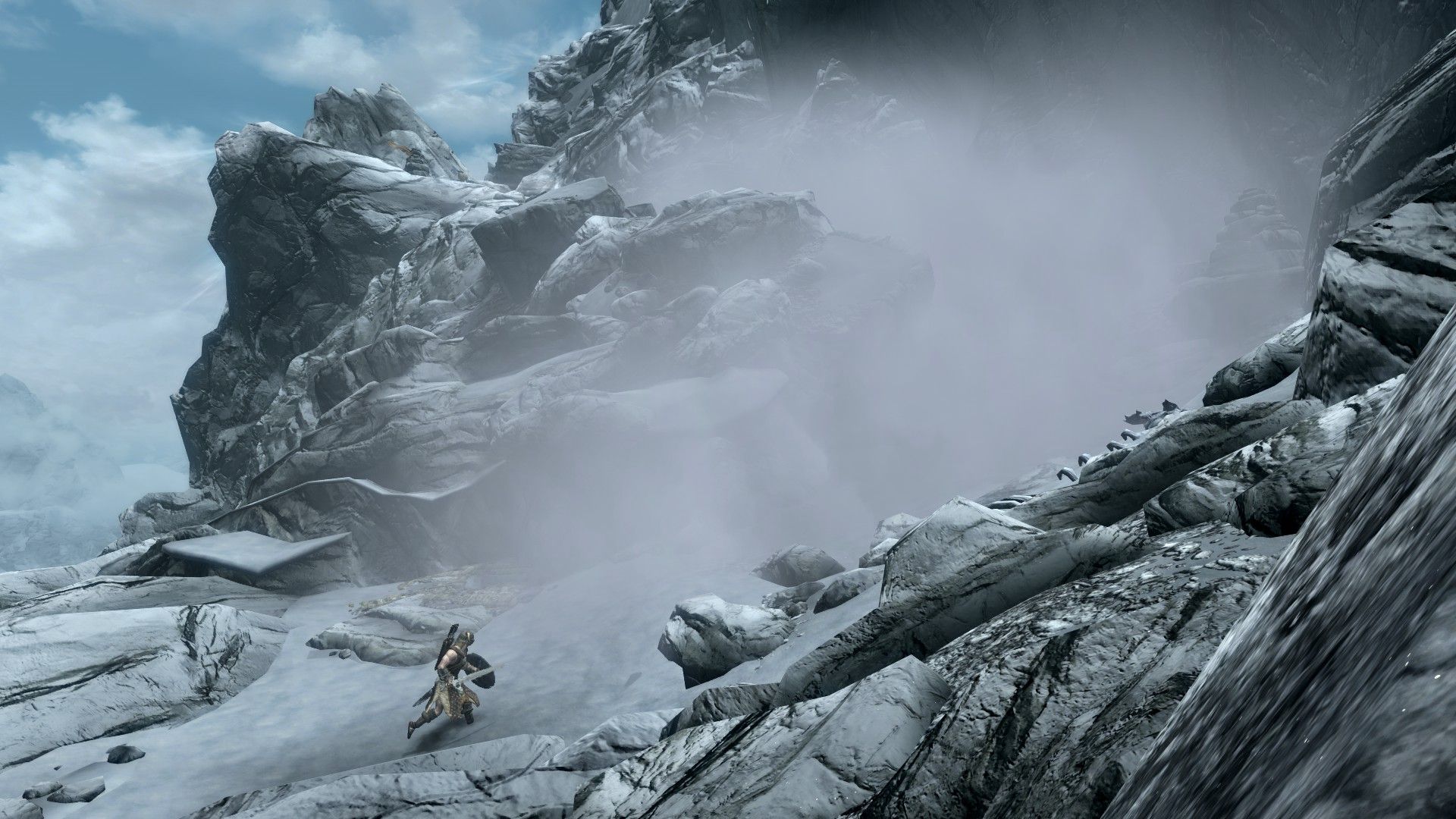 An adventurer runs into a snowstorm at the top of a mountain.