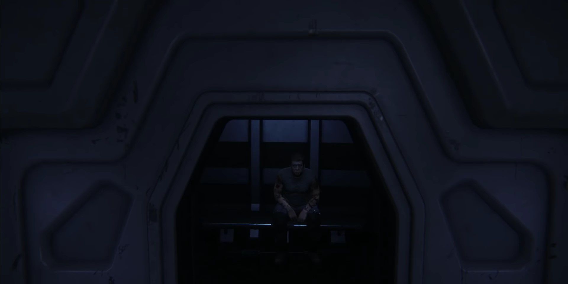Marlow, crewmember of the Aneisodora who brought the xenomorphs to Sevastopol, being questioned by Amanda in a cell.