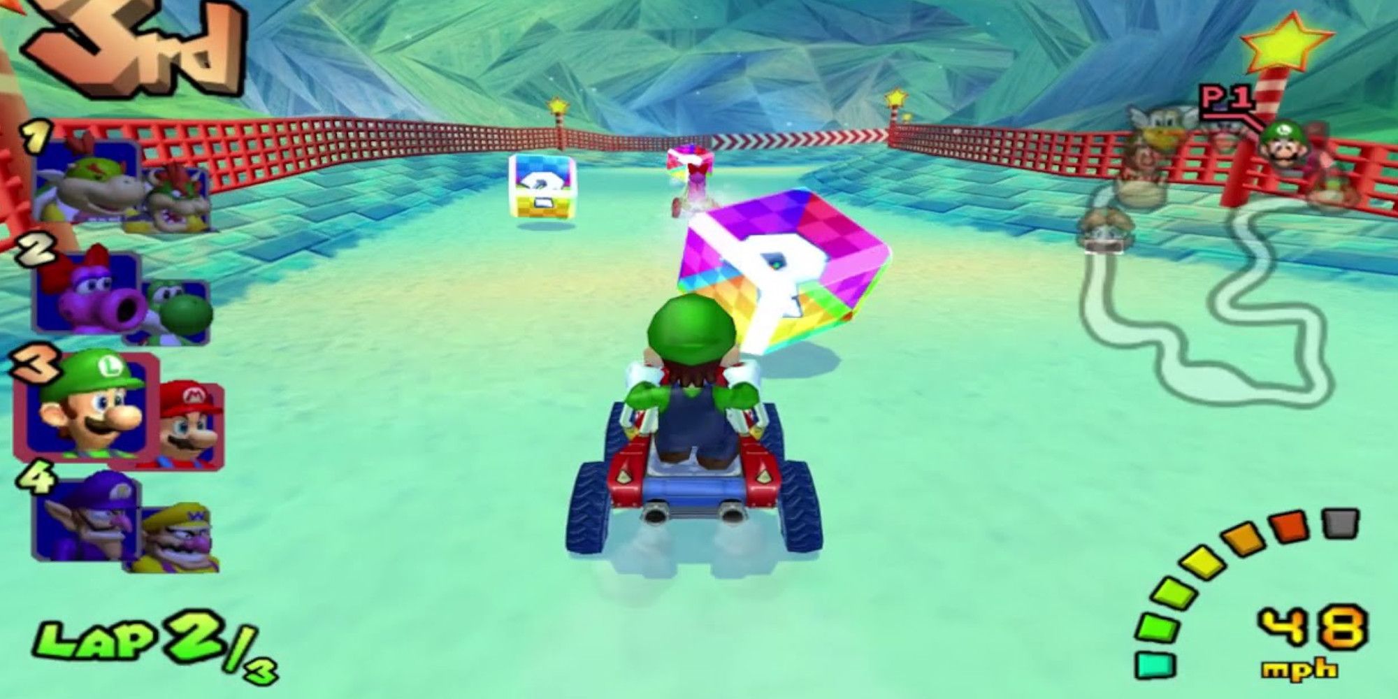 Mario and Luigi racing through Sherbet Land in Mario Kart Double Dash