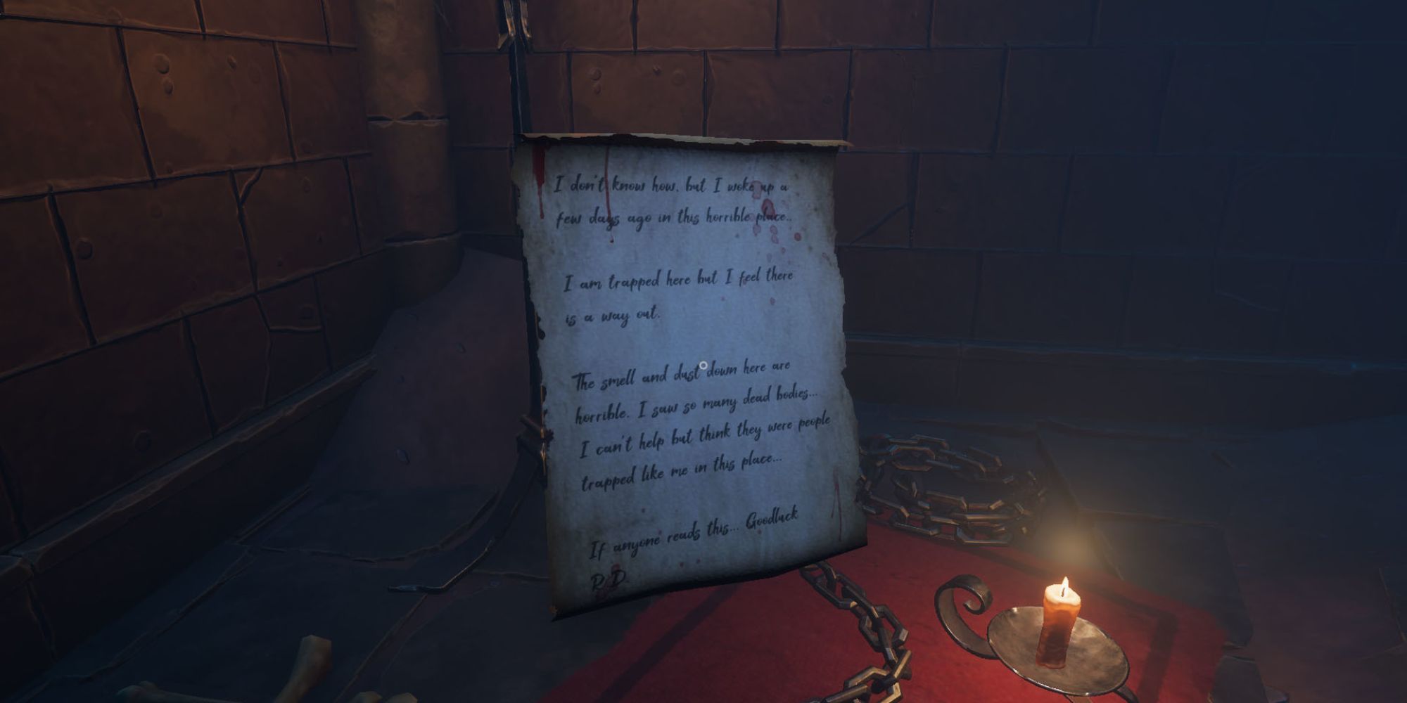 a bloody and tarnished note recounts parting messages from one R.D., a lit candle and chains are in a cell