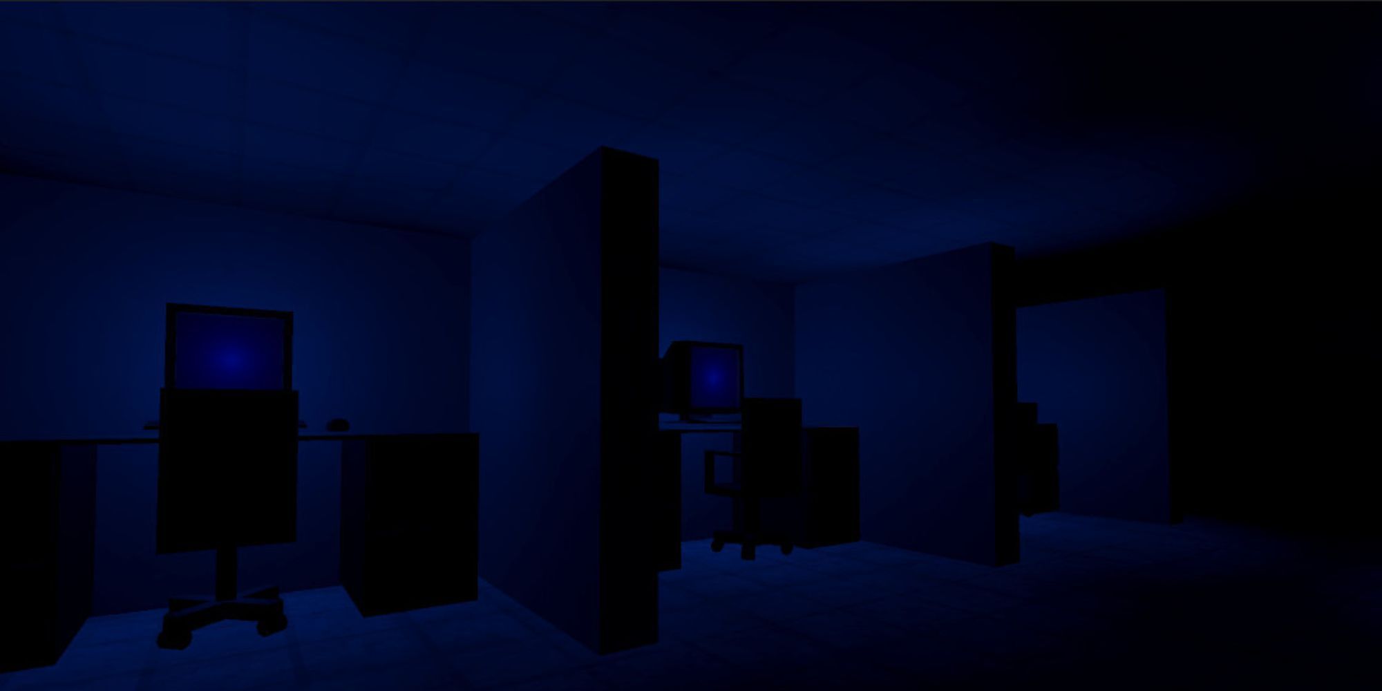 three dim cubicles with PCs and desks faintly flow blue as they are surrounded in darkness