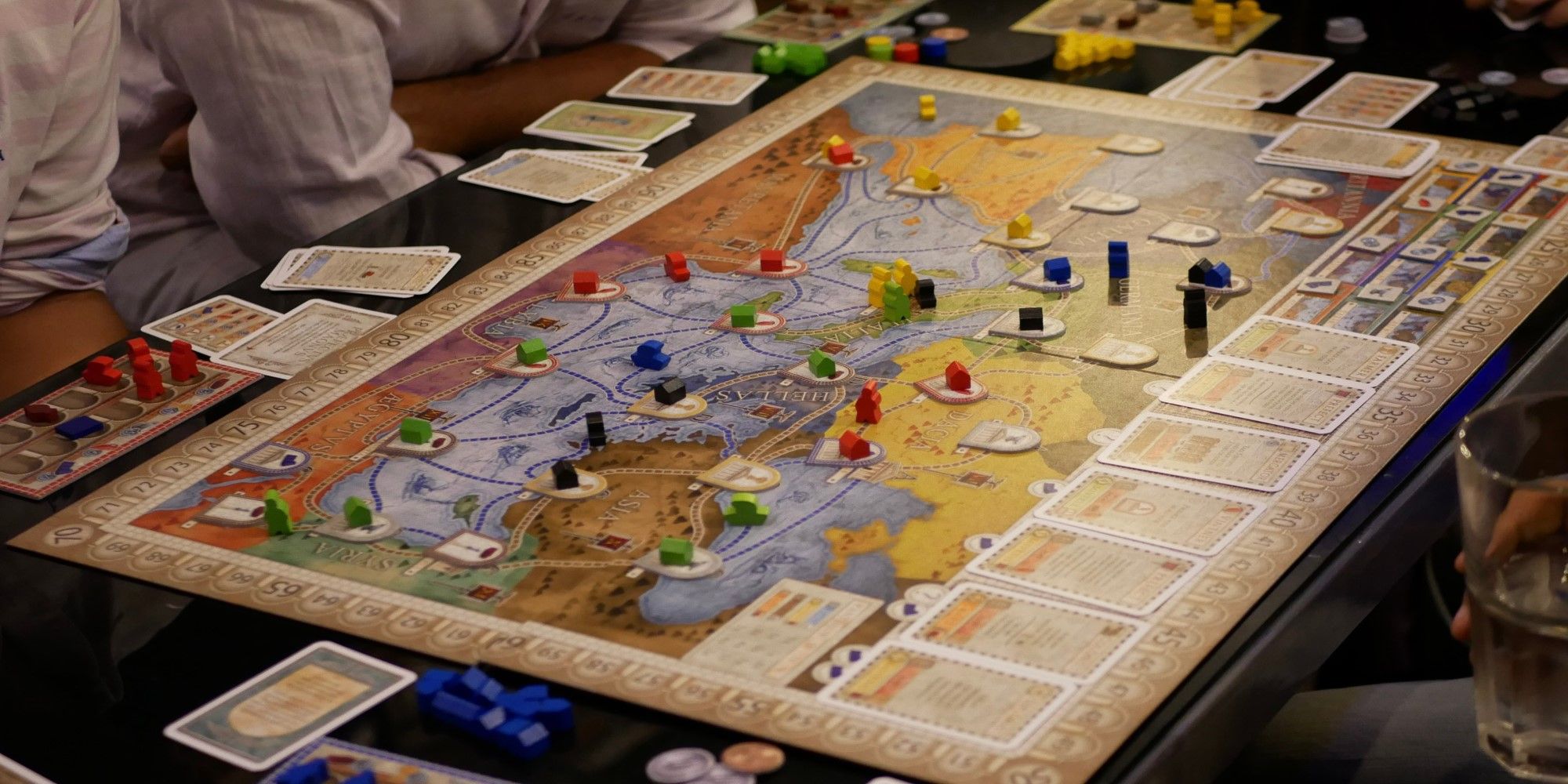 A board game in progress, set up on a table.