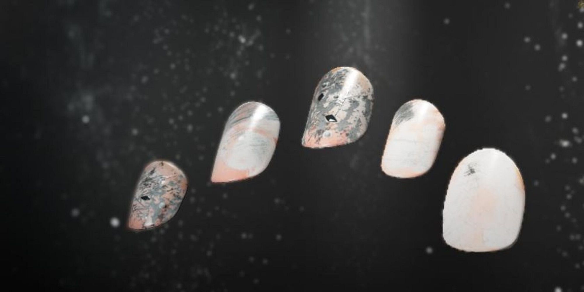 Escalate Nails in Forspoken. Pink and Grey granite swirls color the nails.