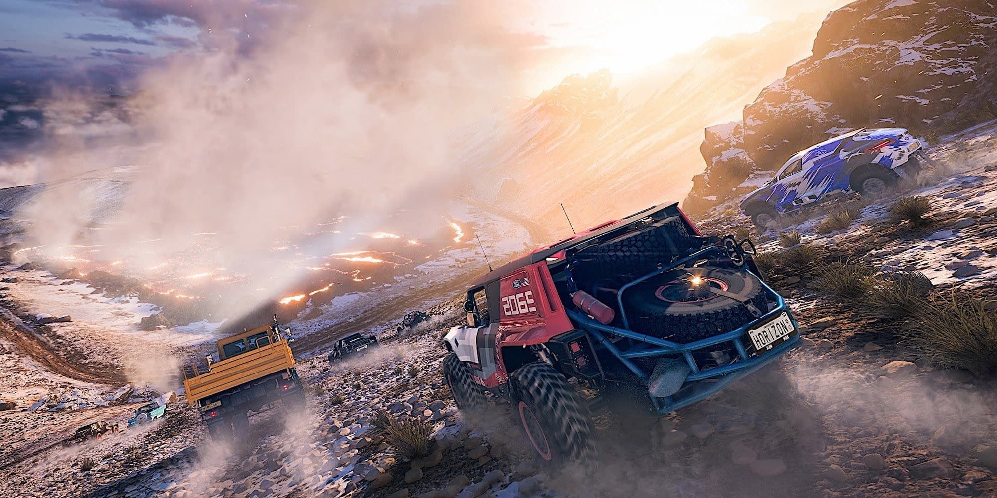 Off-road vehicles whip up some dirt as they race down a hill in Forza Horizon 5.