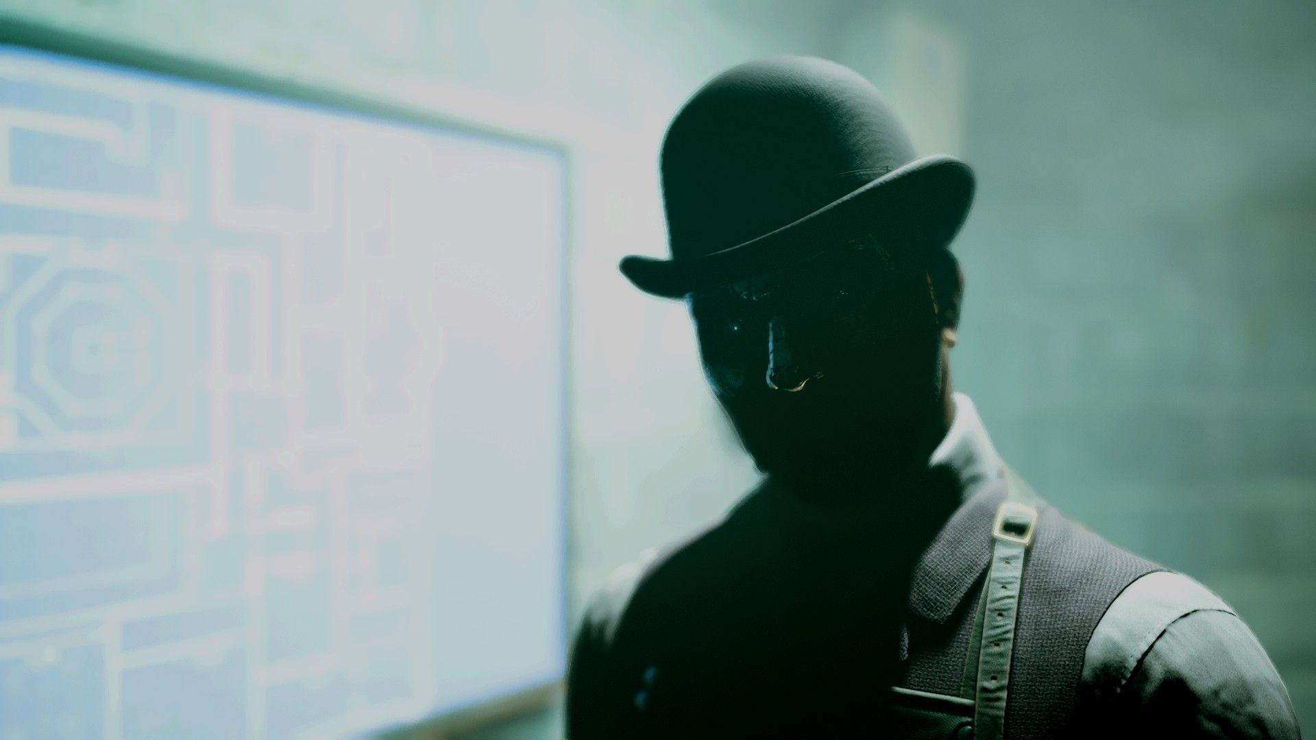 Du'Met stands by the blueprints to his murder hotel in The Devil In Me