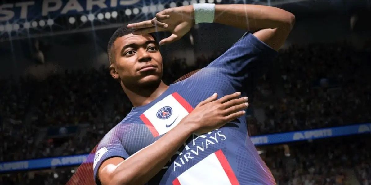 Kylian Mbappe saluting in celebration of a goal for PSG