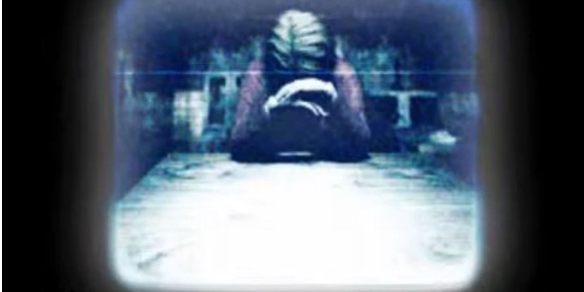 The videotape showing Lisa with her head in her hands in Silent Hill.