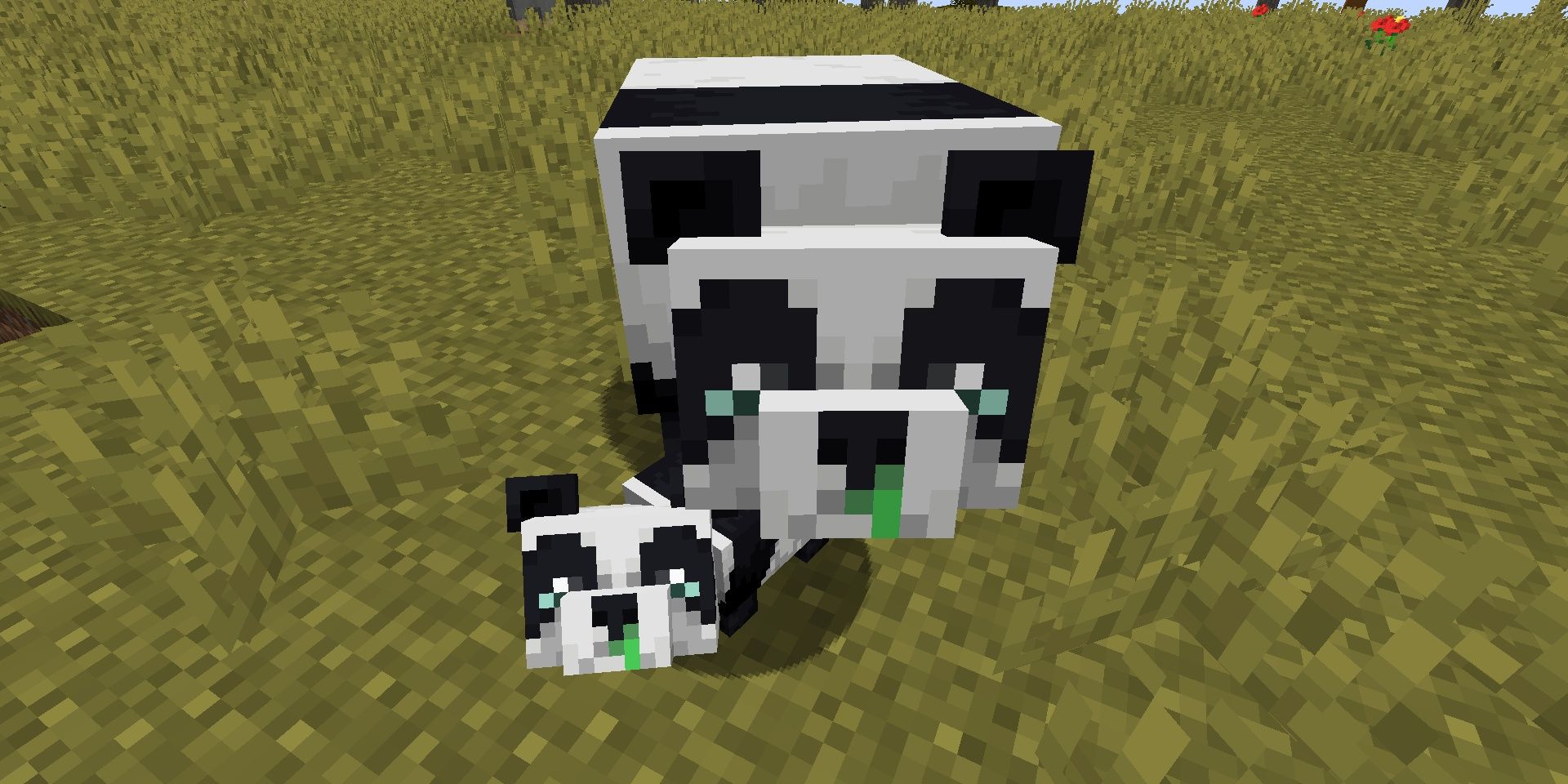 An adult and baby panda with runny noses in Minecraft