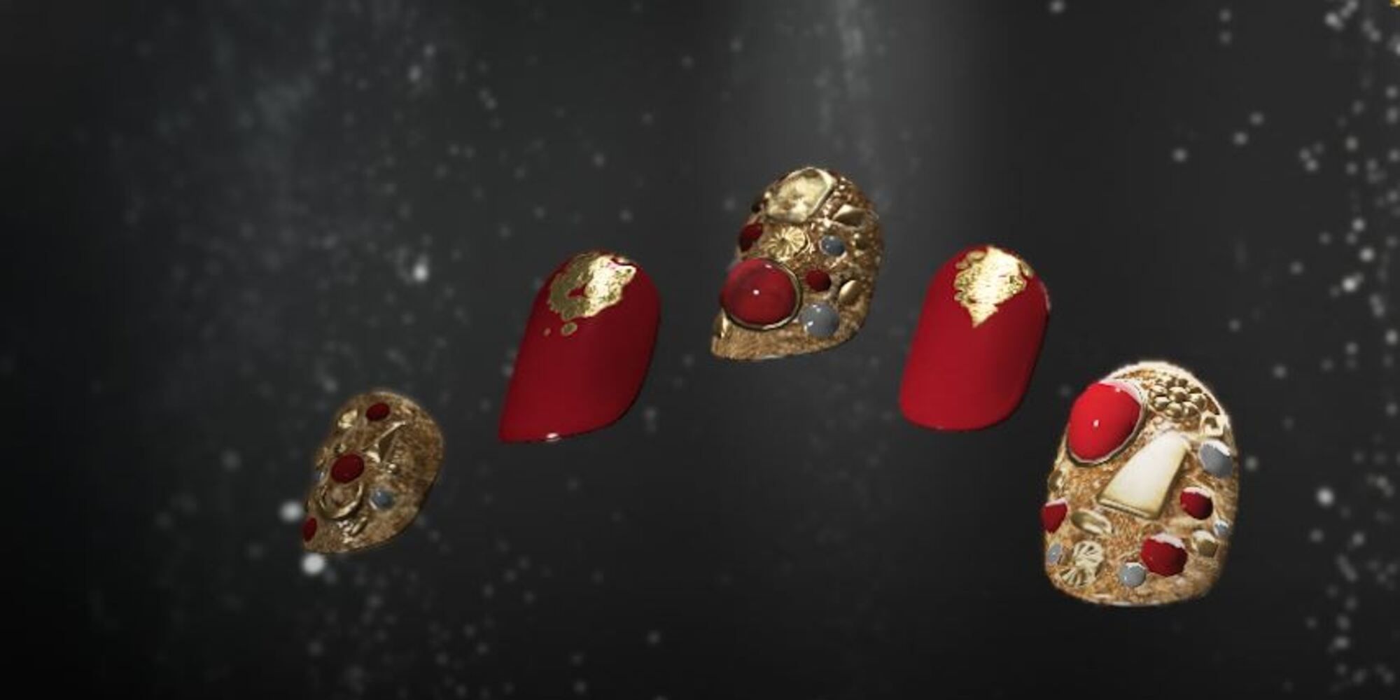 Passion Nails are bright red and solid gold, with gold and red gems and jewels covering them