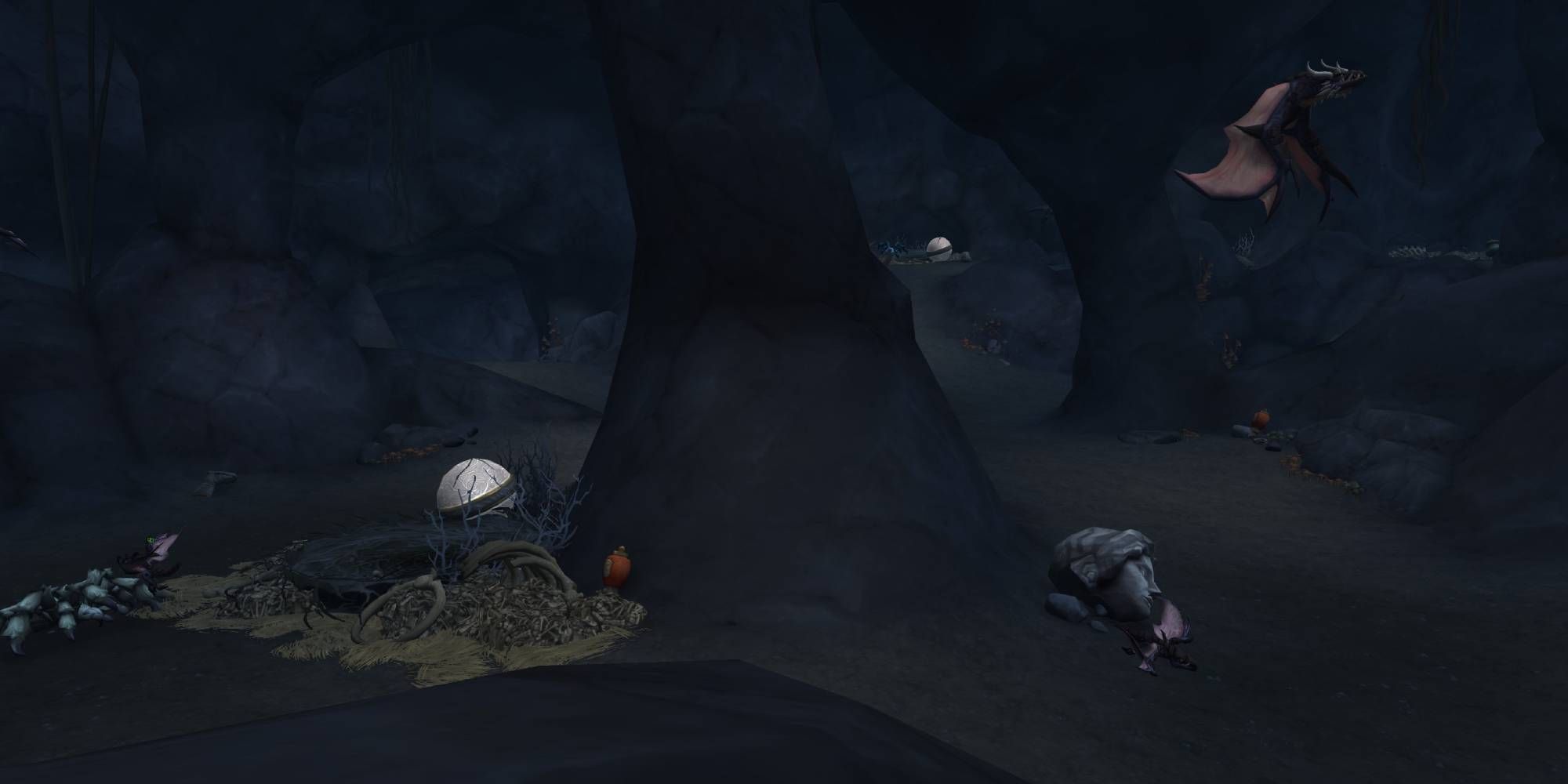 WoW Dragonflight - a view inside the Forgotten Grotto, with Titan Relics and drake enemies