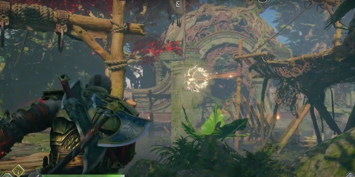 1 Kratos throwing spear into pillar in the abandoned village