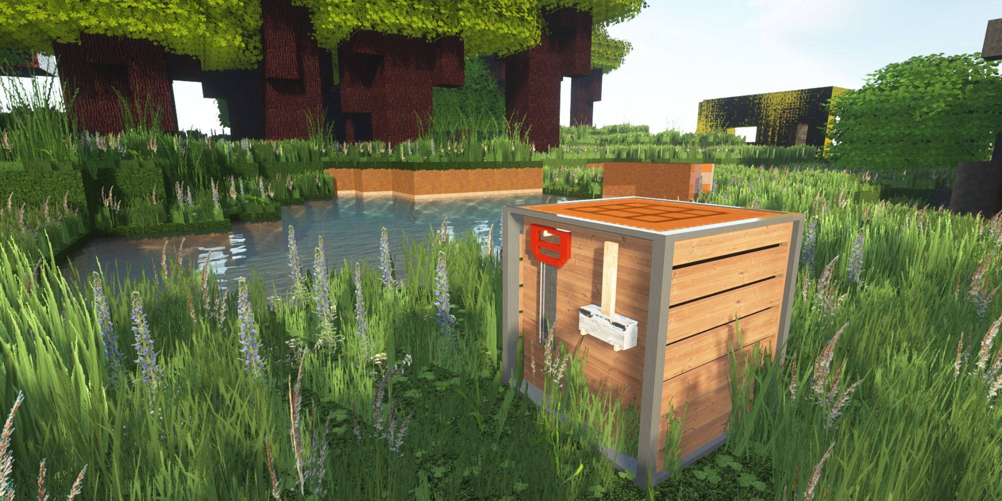 A grassy field with a crafting table in Minecraft using the Luna HD resource pack