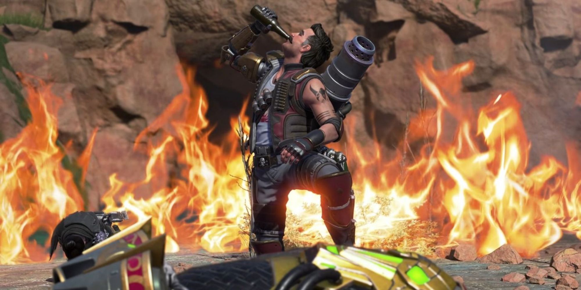 Apex Legends - Fuse stands over a body while holding a drink in his hand