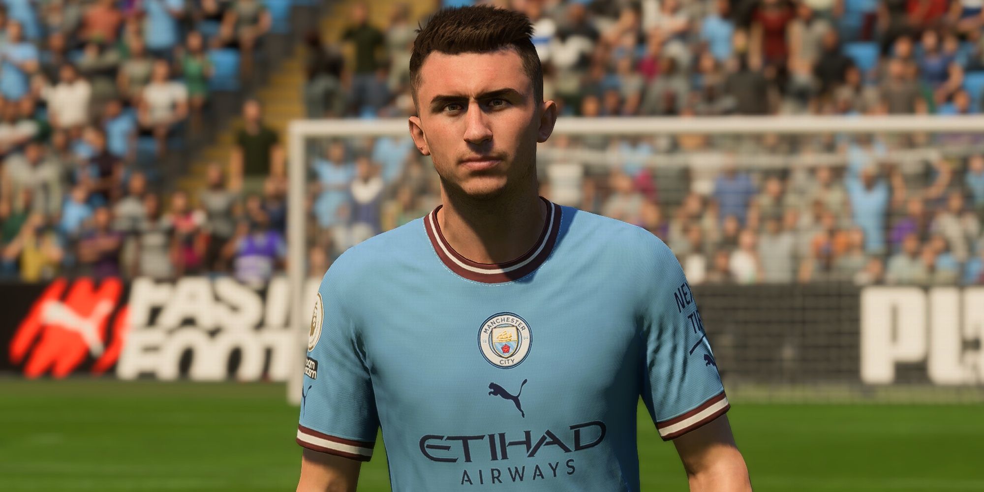Aymeric Laporte wearing the Manchester City home kit in FIFA 23