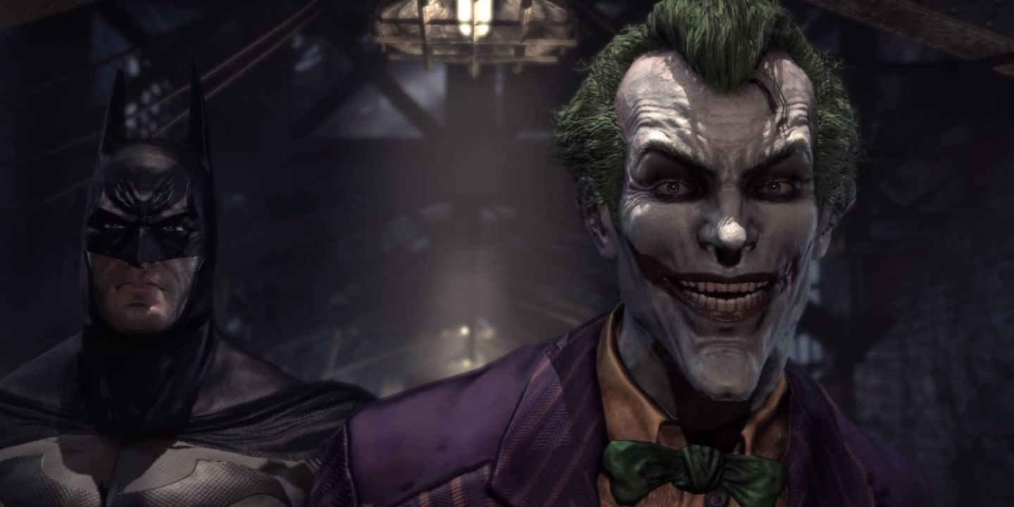 Batman standing behind the Joker in Batman Arkham Asylum 