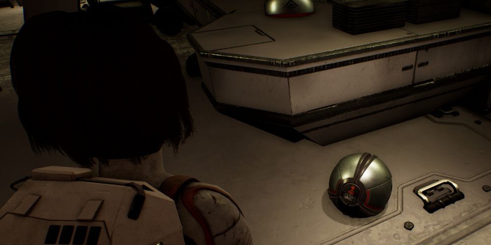 Kat examines a disabled security drone