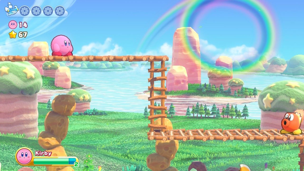 Kirby Enters Stage Four wih a fire enemy below the ladder.